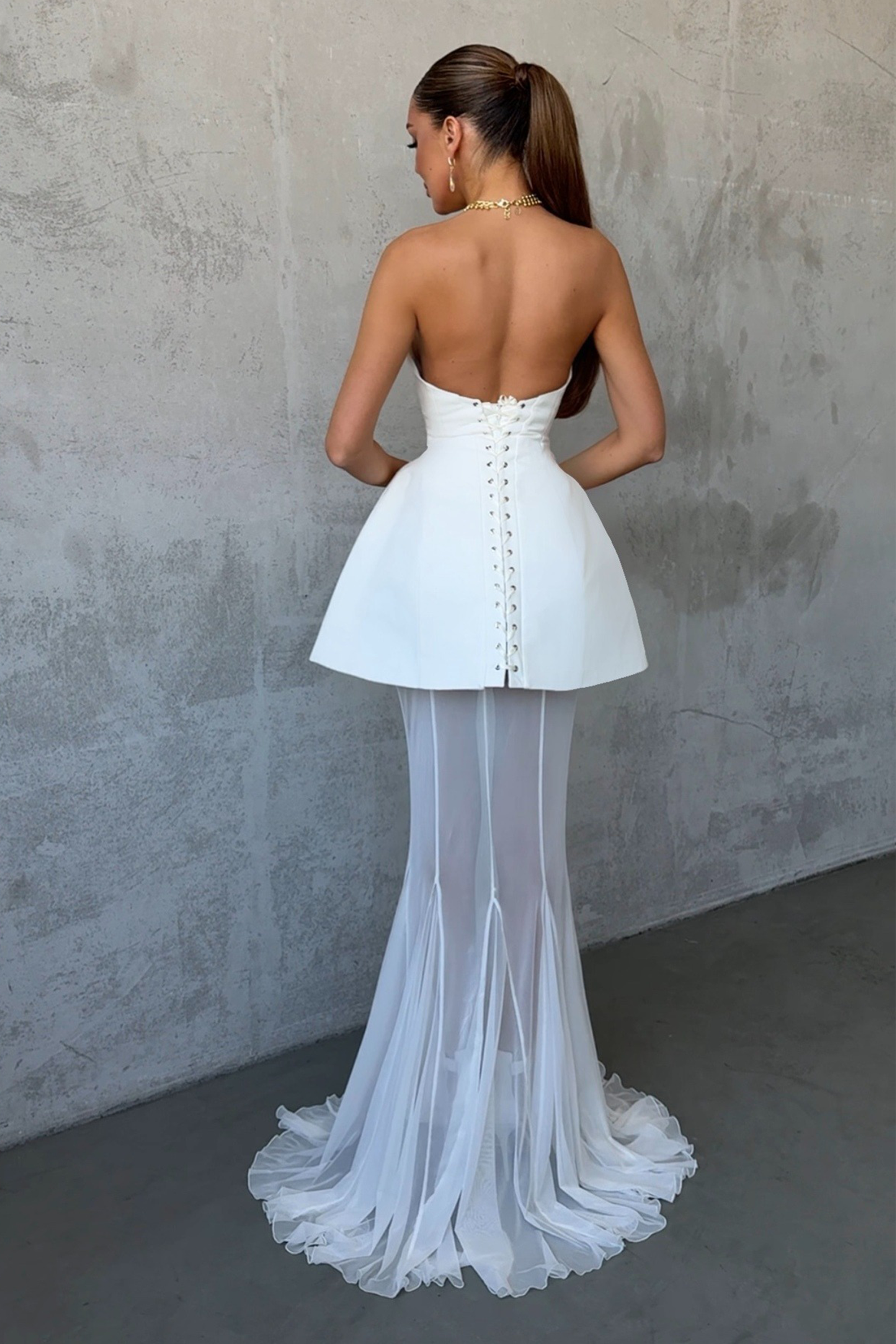 مجموعة فستان كورساج أسود و تنورة شبكية من ميلاني