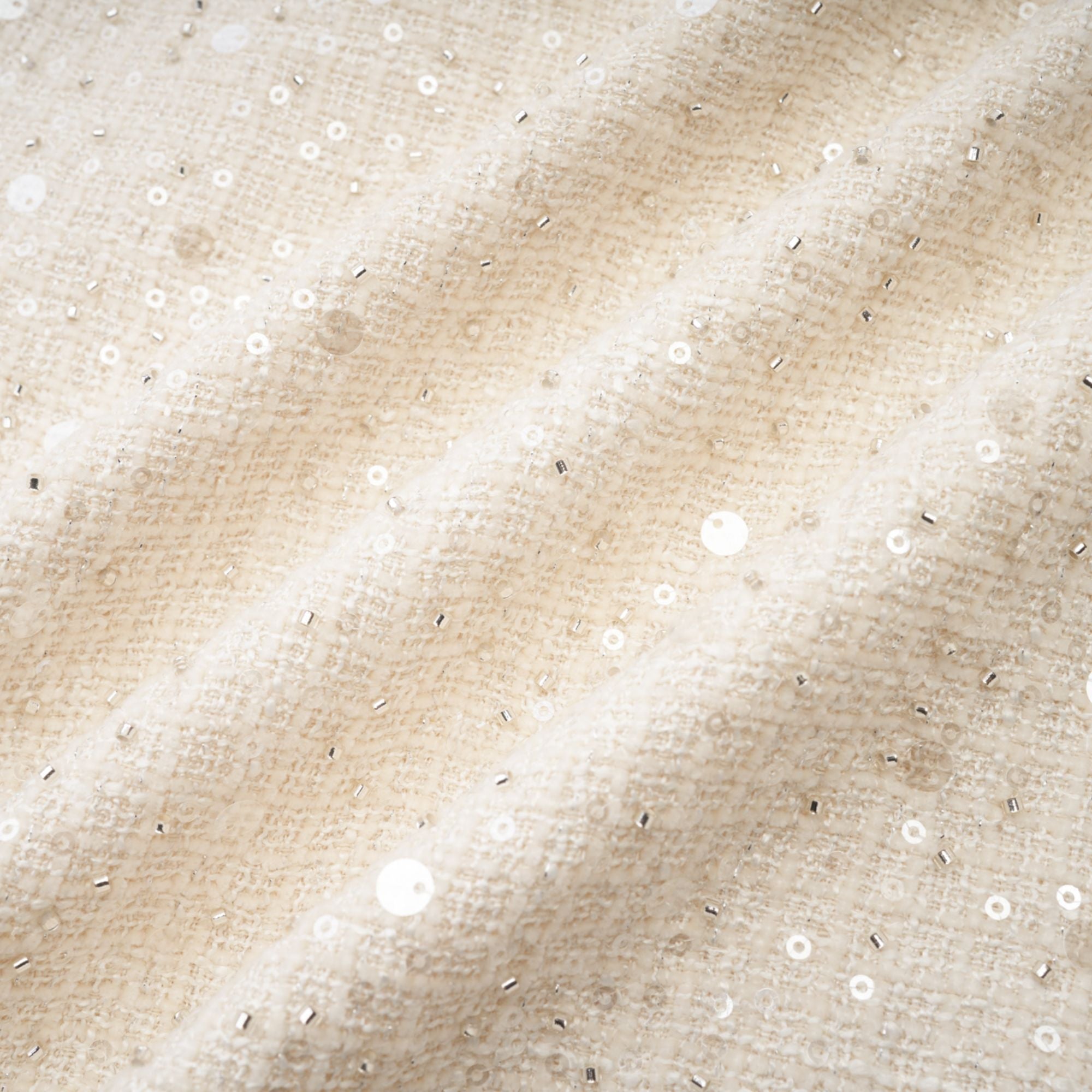 فستان مانون قصير من قماش التويد باللون الأزرق ومزين بالترتر