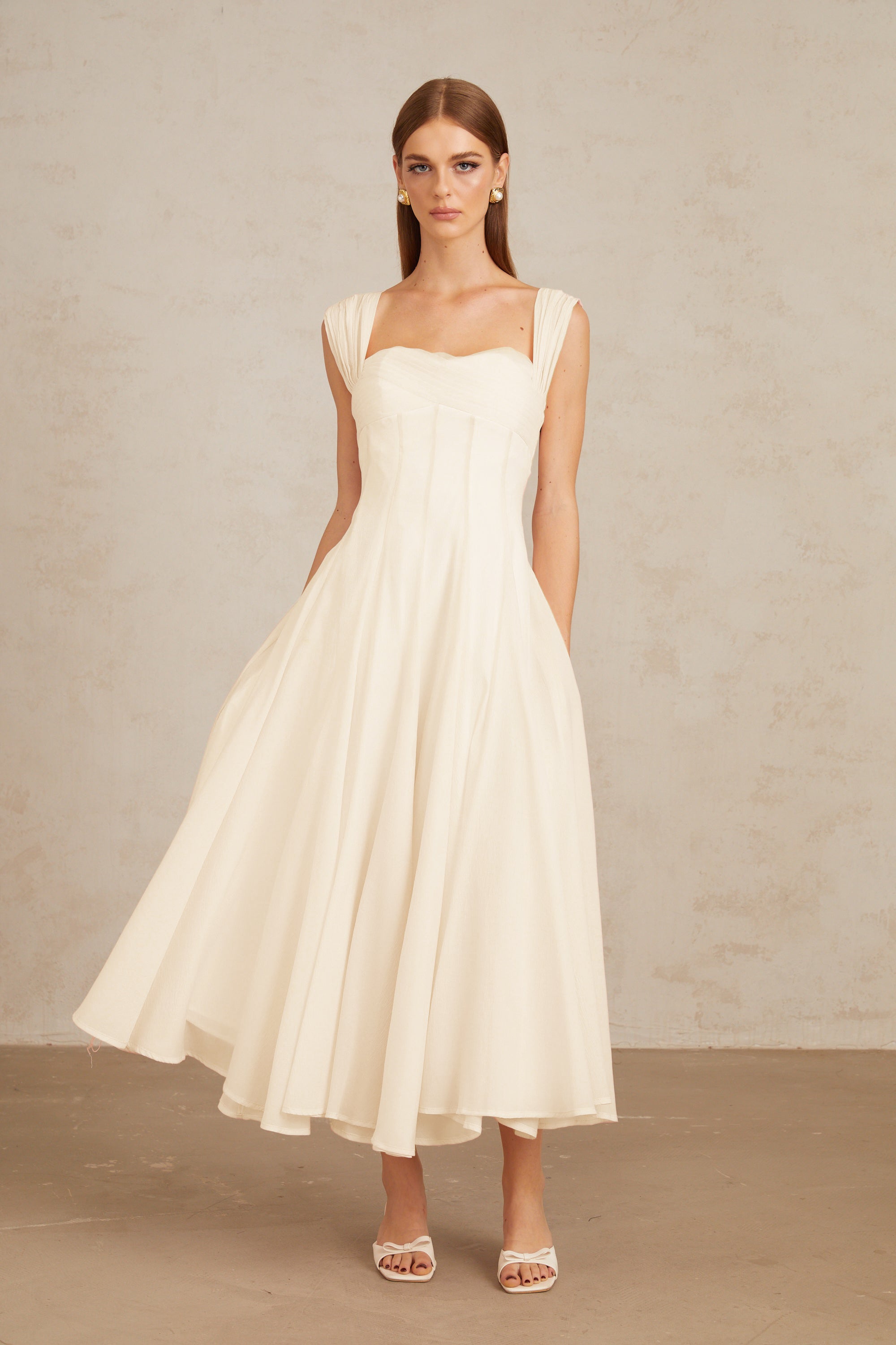 Érasme Cremeweißes Midikleid mit Volant