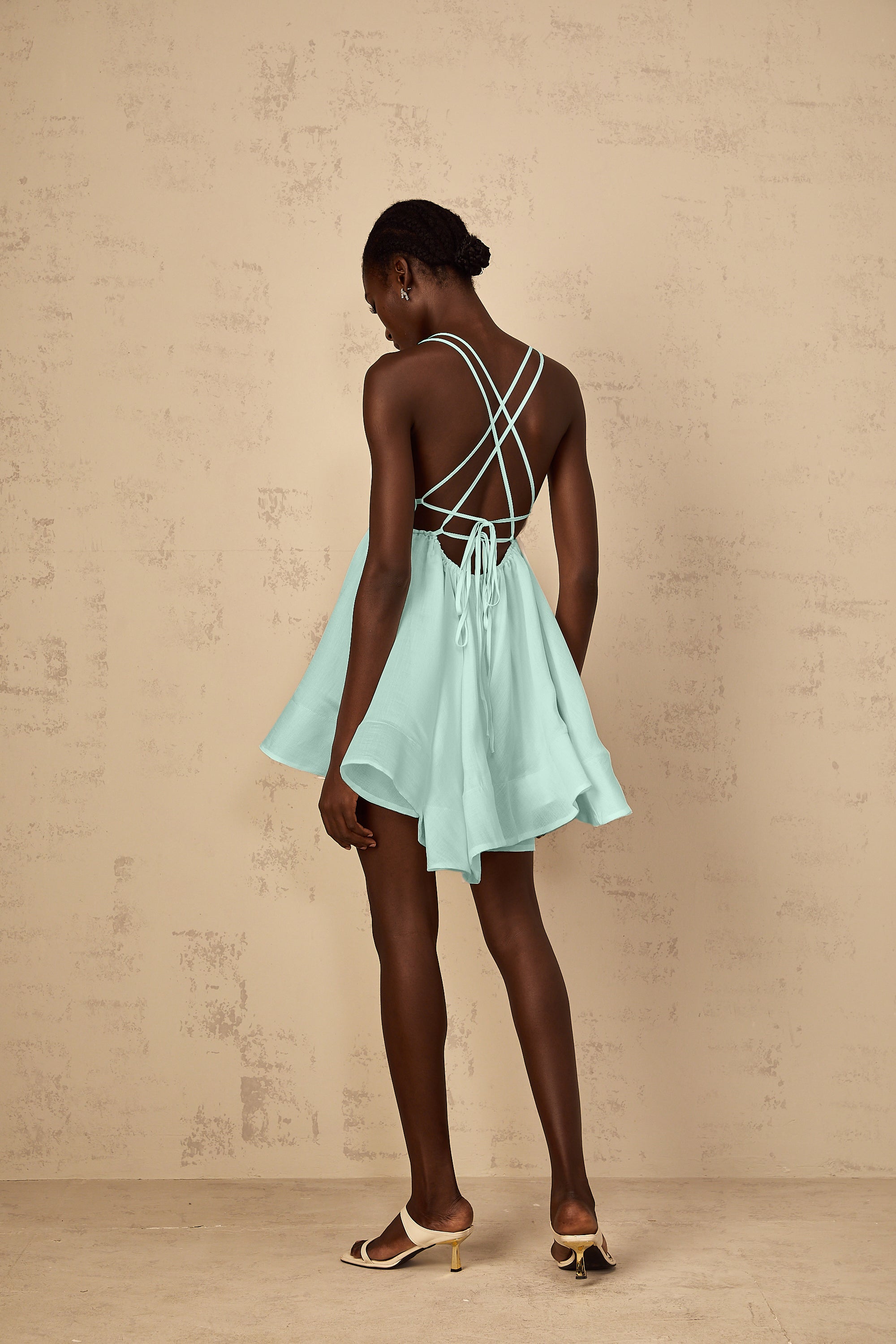 Quincie Green Shirred Flounced Mini Dress