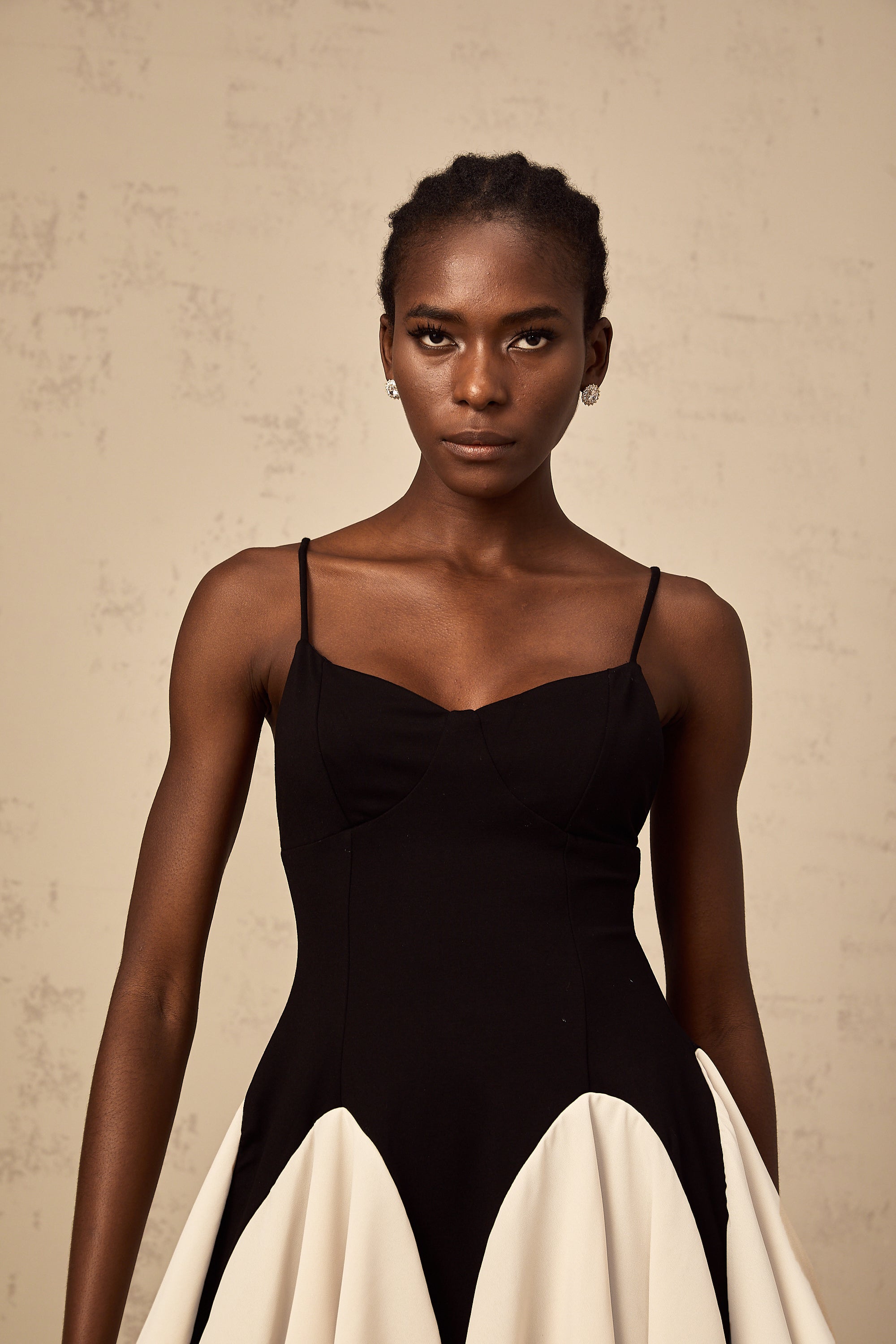 Justine color-blocked godet pleated mini dress