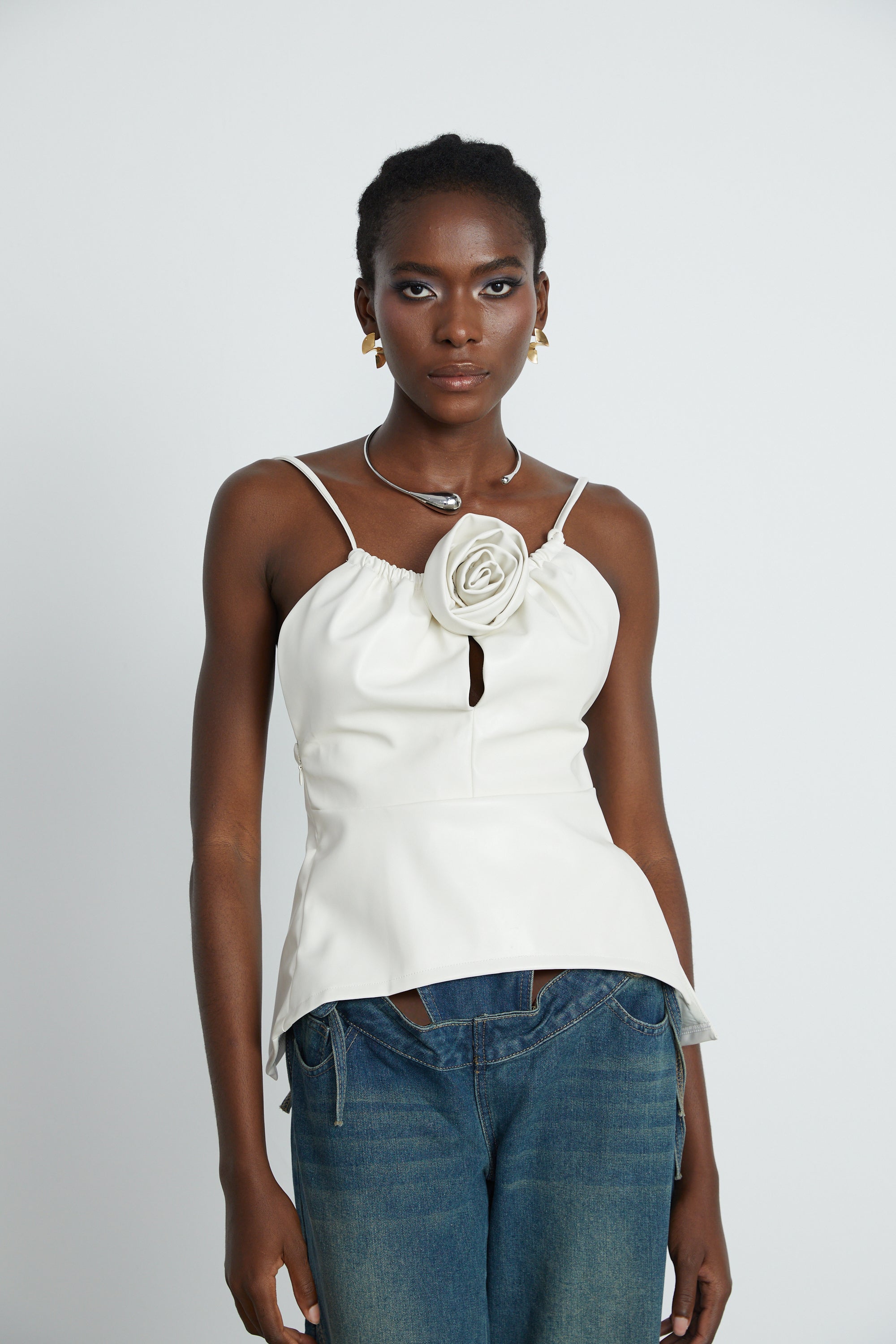 Sancia floral-appliqué leather top