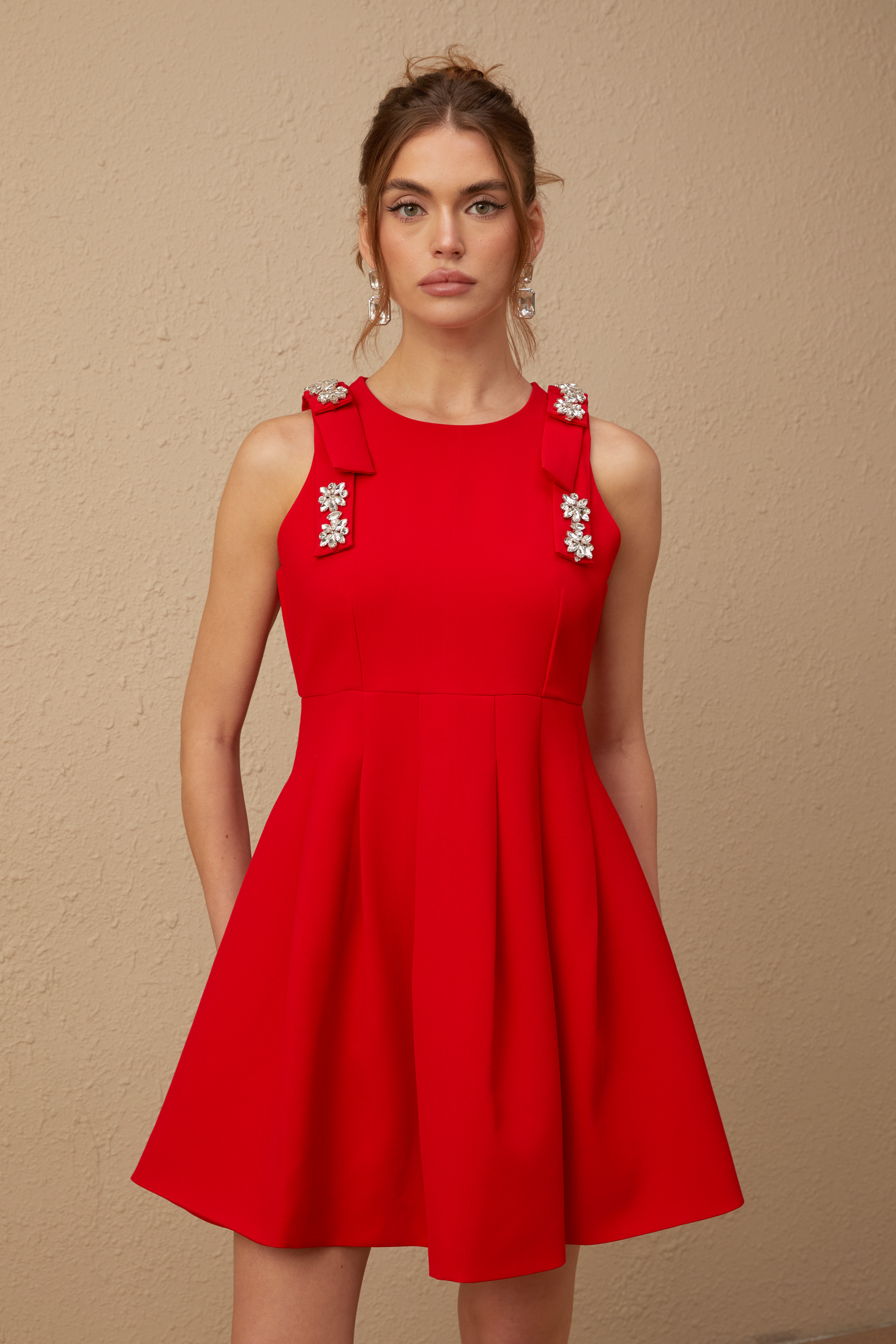 Louisa red bow sleeveless pleated mini dress