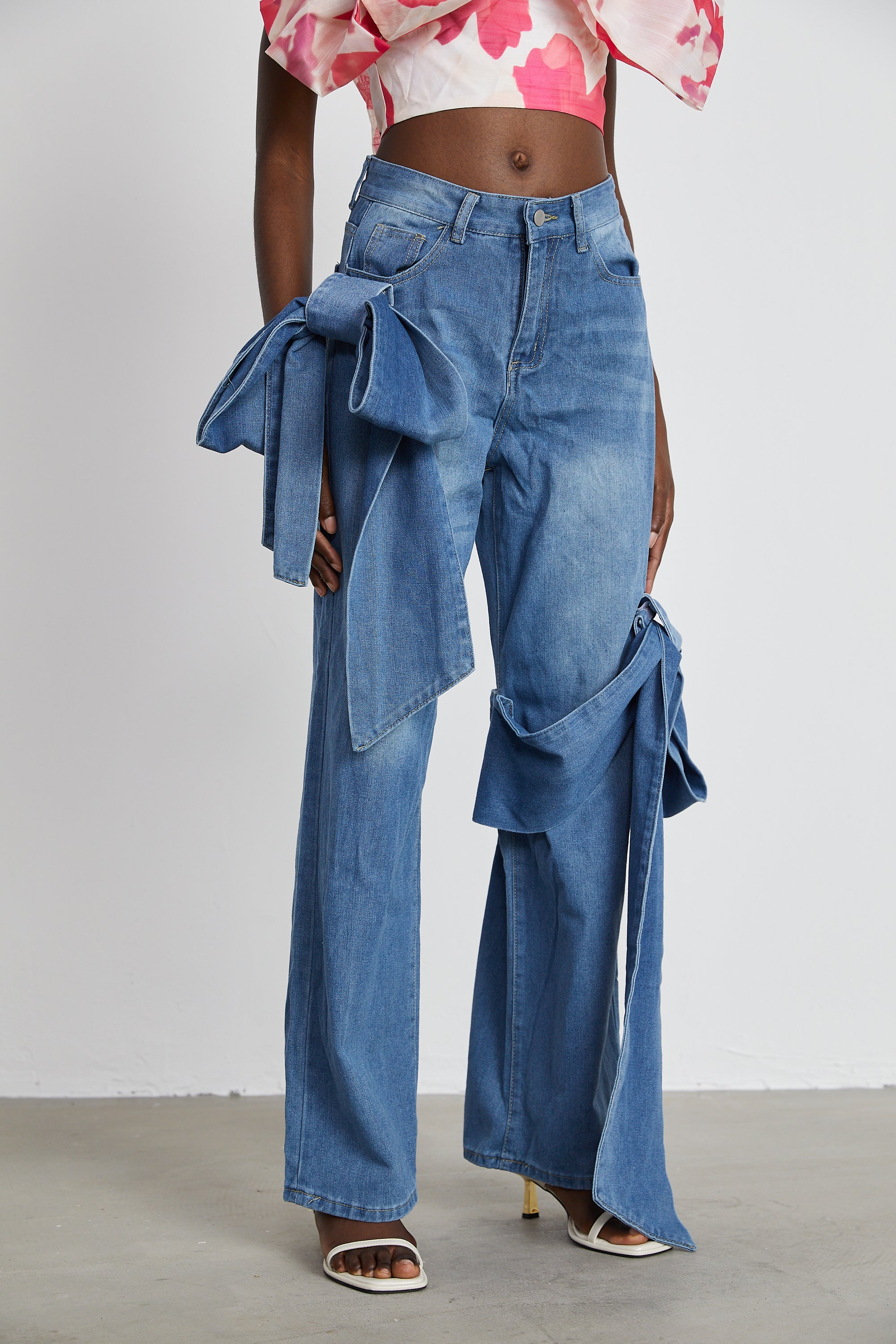 Ysabella bow-detail wide-leg jeans