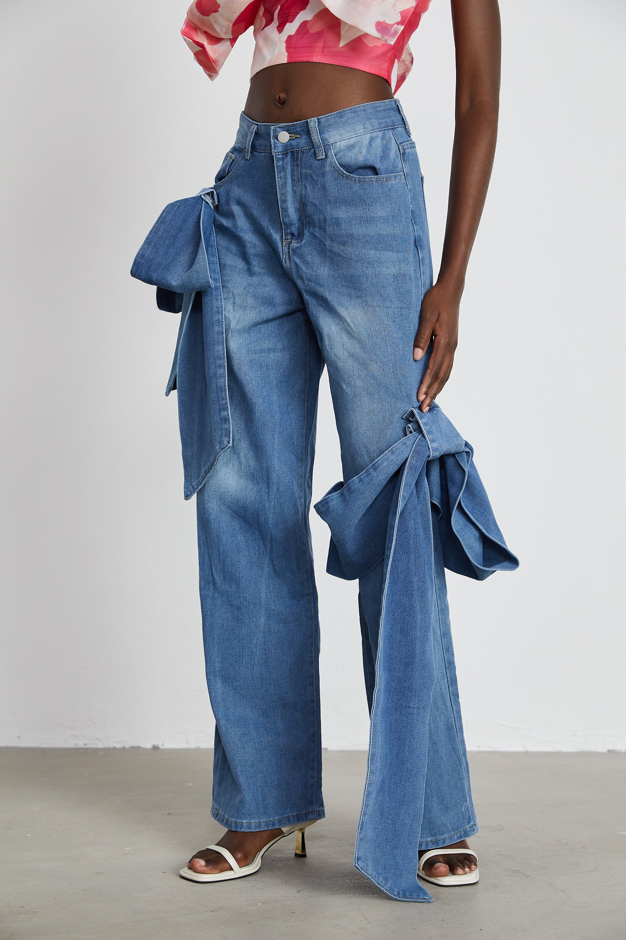 Ysabella bow-detail wide-leg jeans