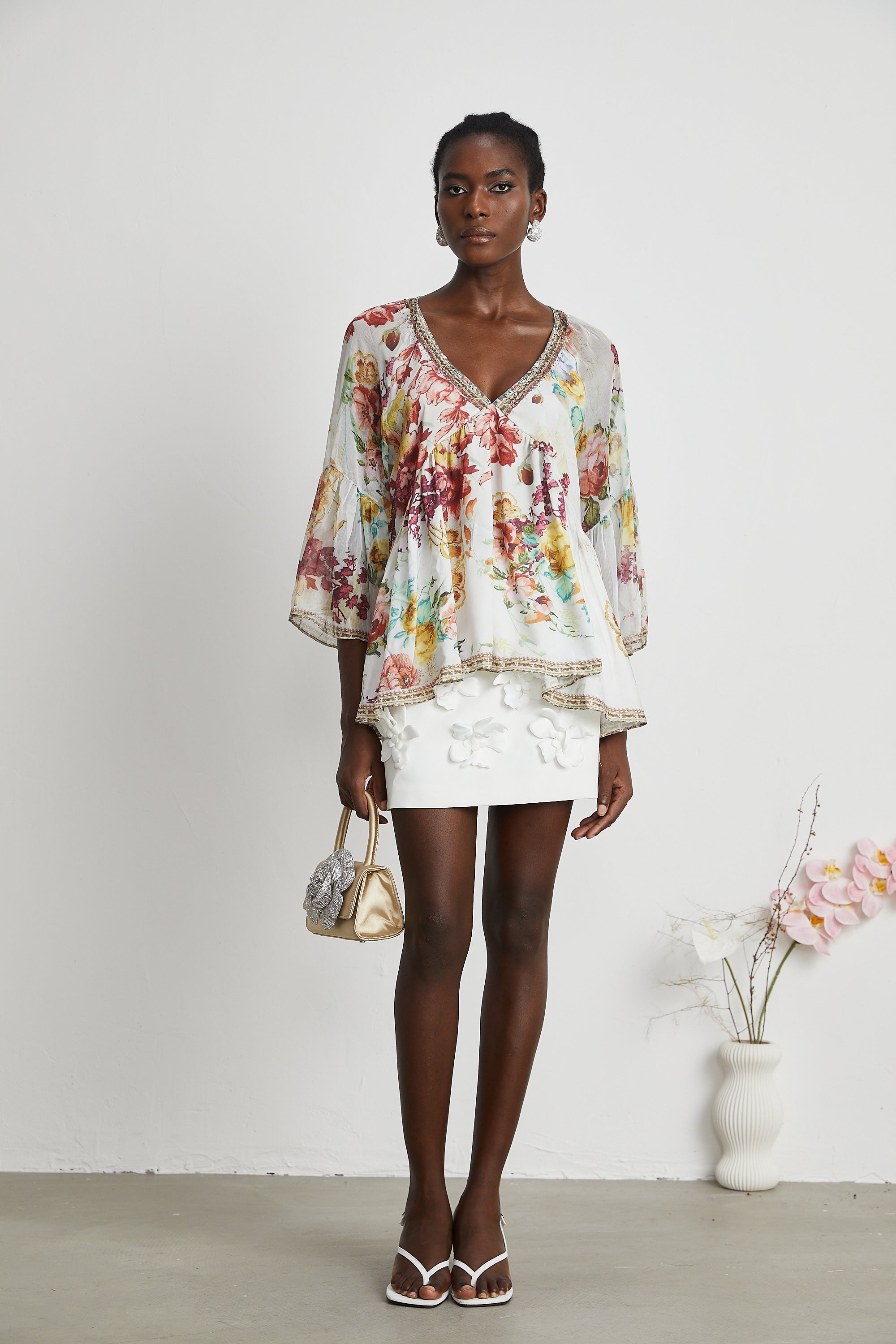 Yvonne V-neck floral-print embellished blouse