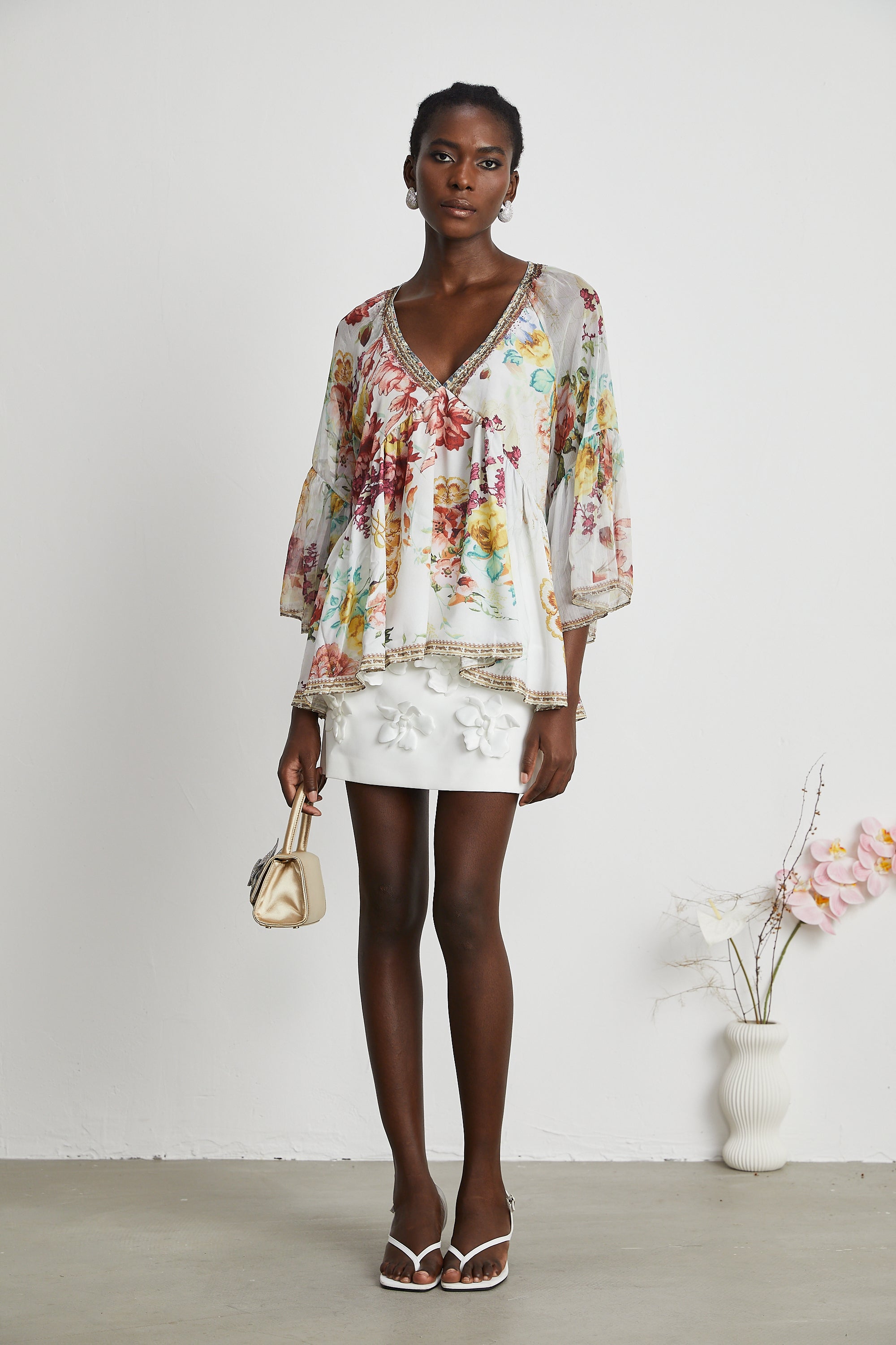 Yvonne V-neck floral-print embellished blouse