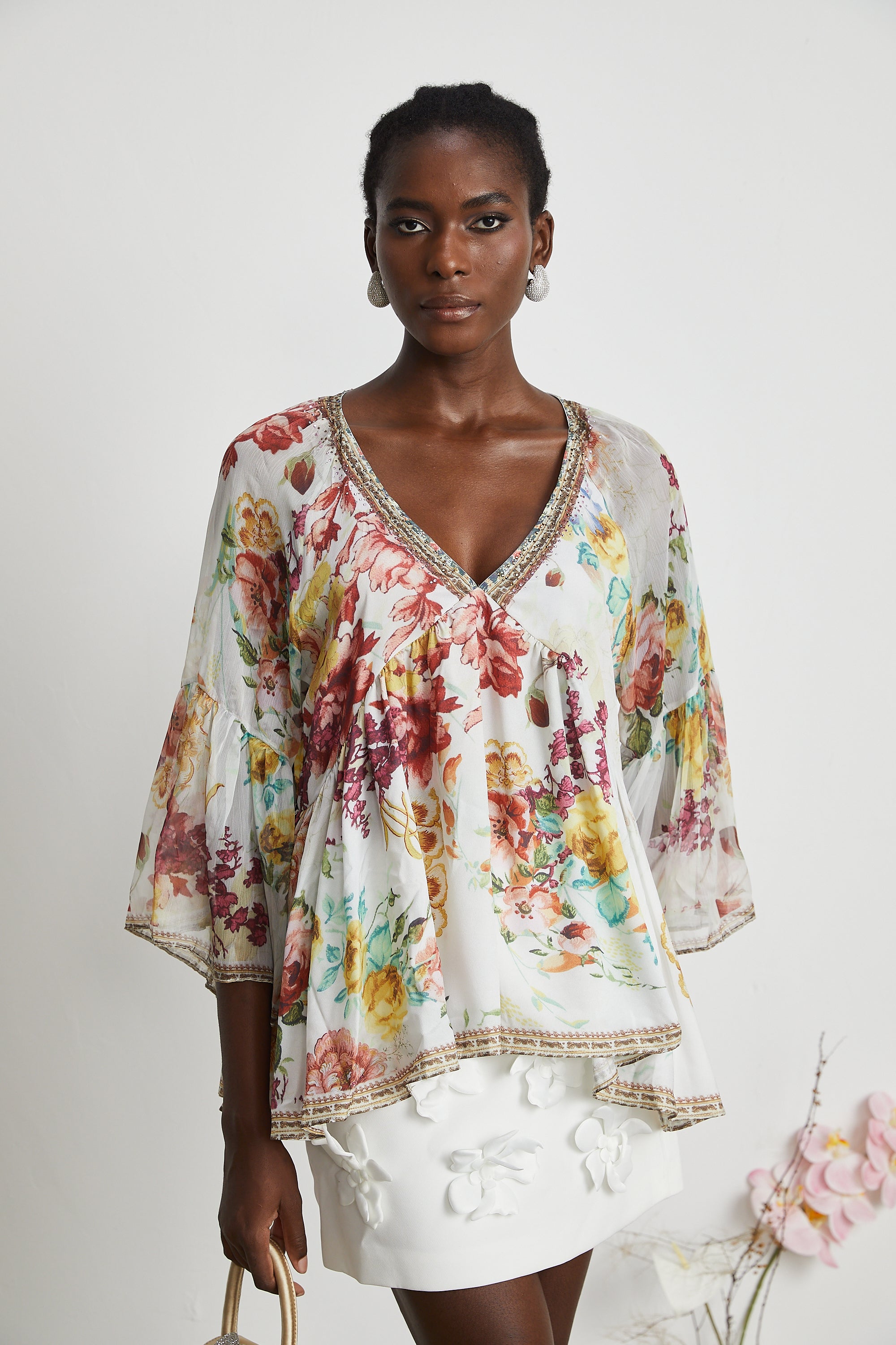 Blusa Yvonne con scollo a V in tulle con stampa floreale 