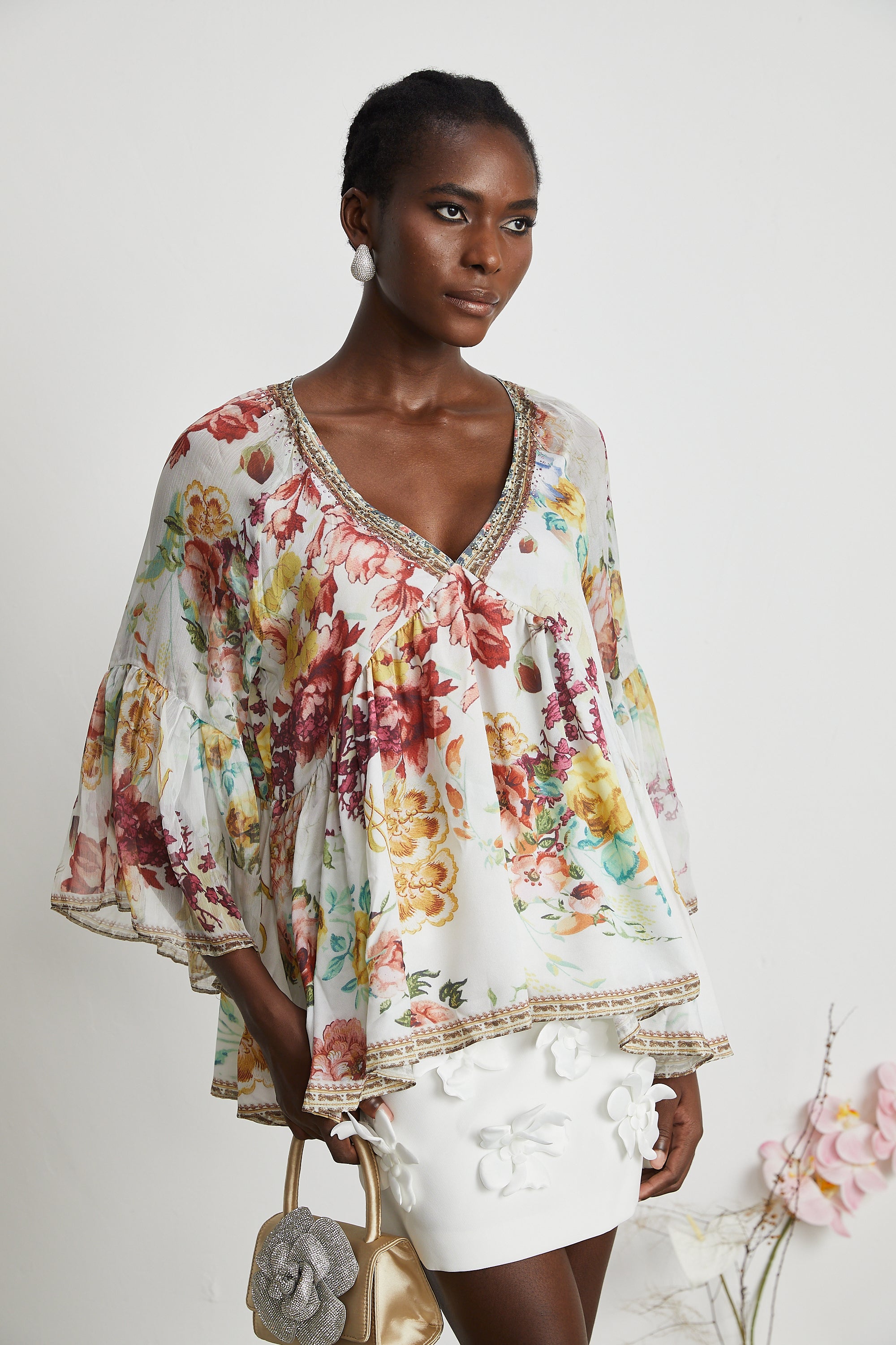 Blusa Yvonne con scollo a V in tulle con stampa floreale 