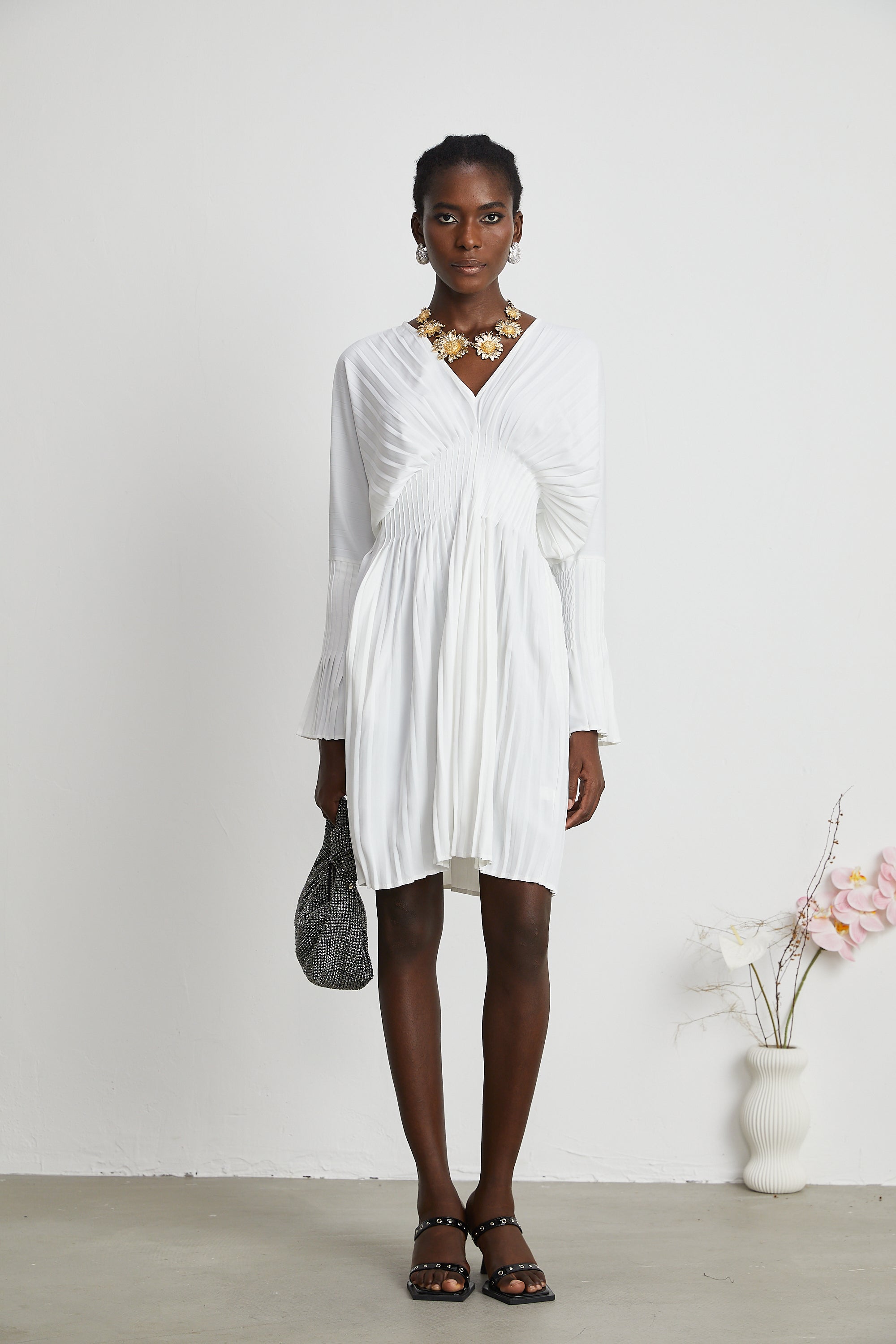 Claudette V-neck pleated mini dress