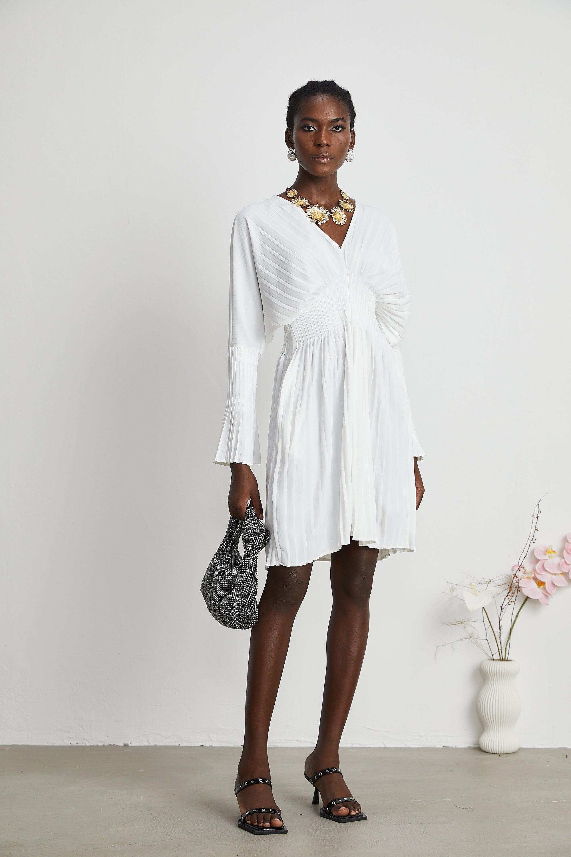 Claudette V-neck pleated mini dress