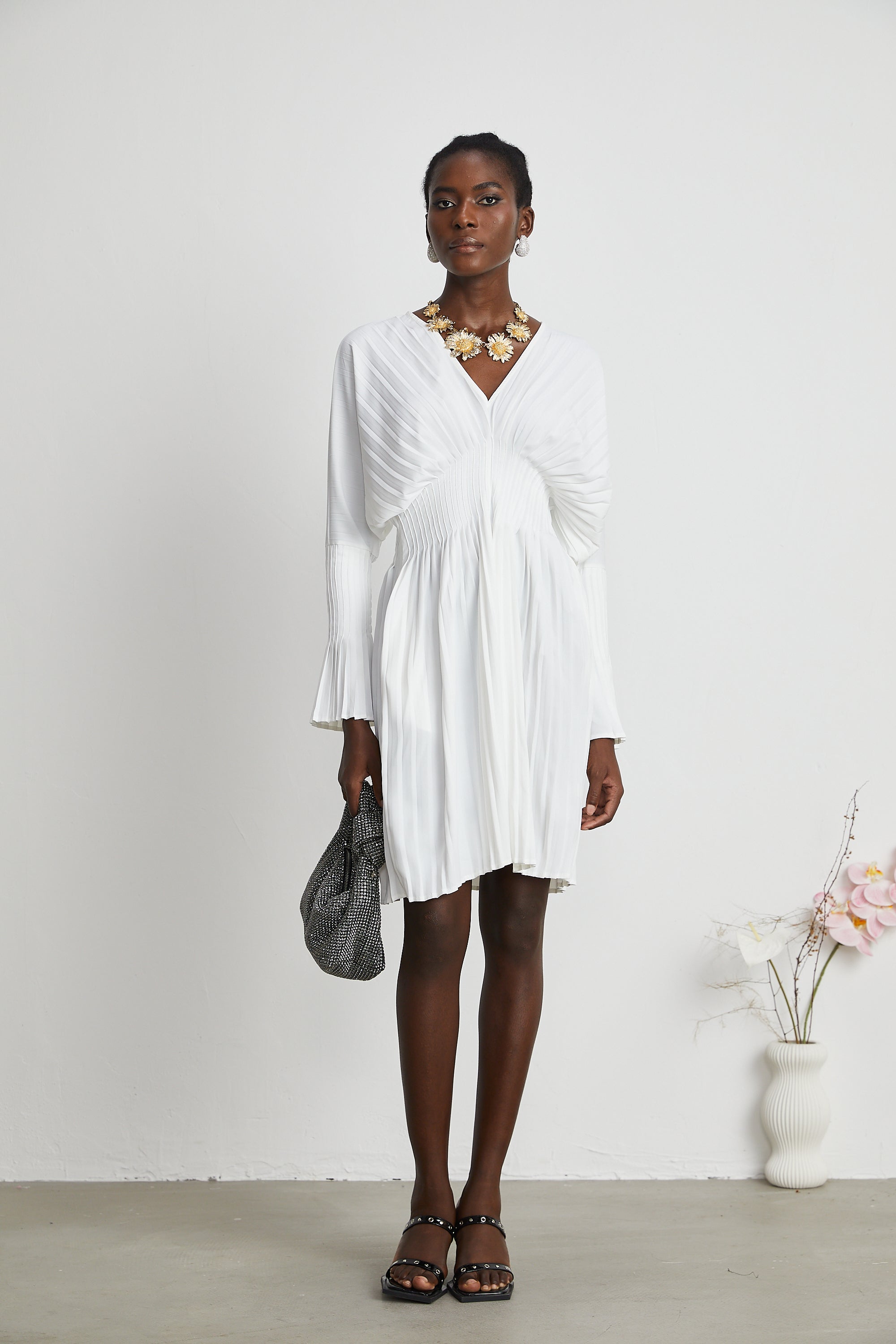 Claudette V-neck pleated mini dress