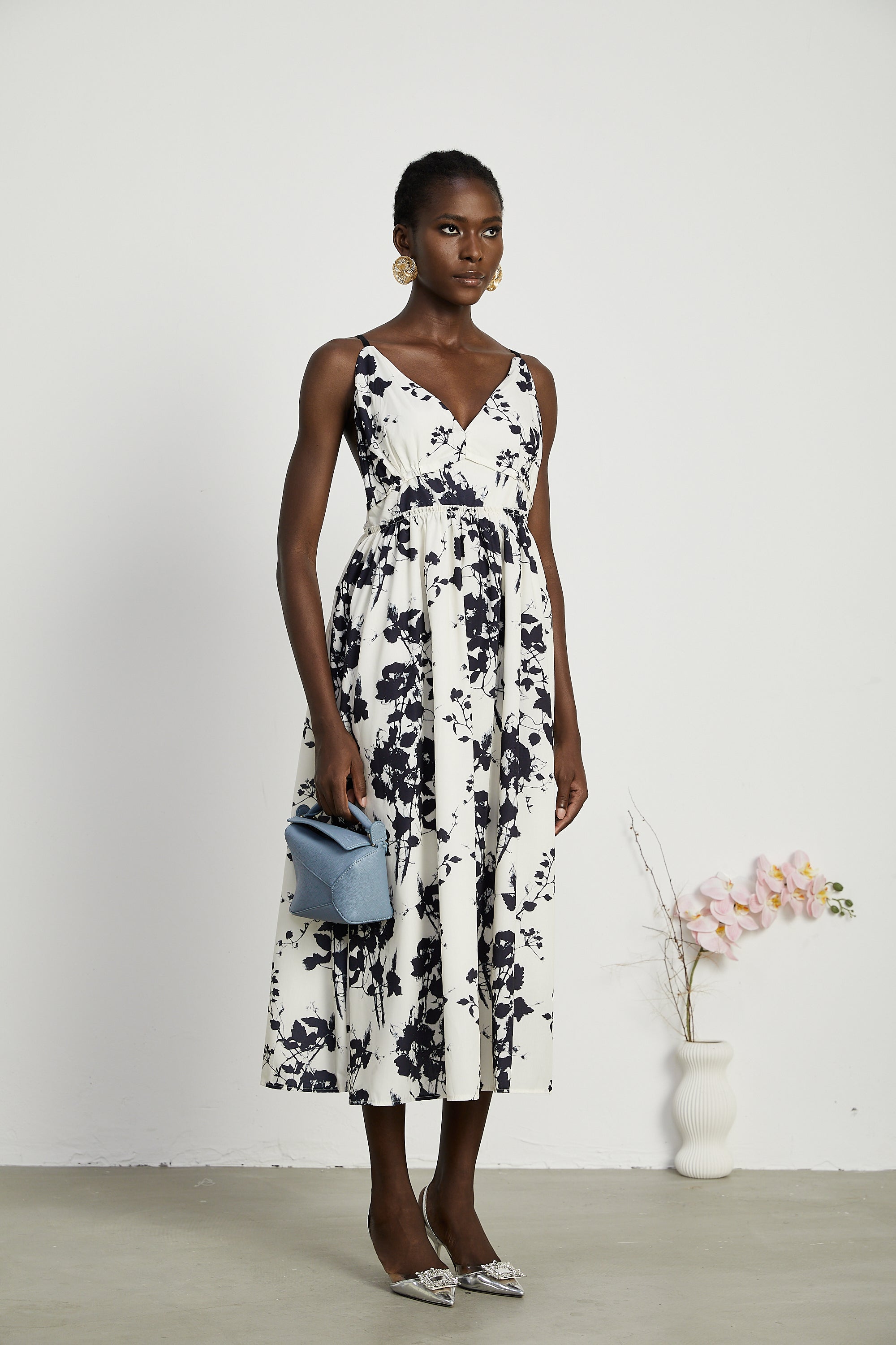 Persephone pleated floral-print midi dress