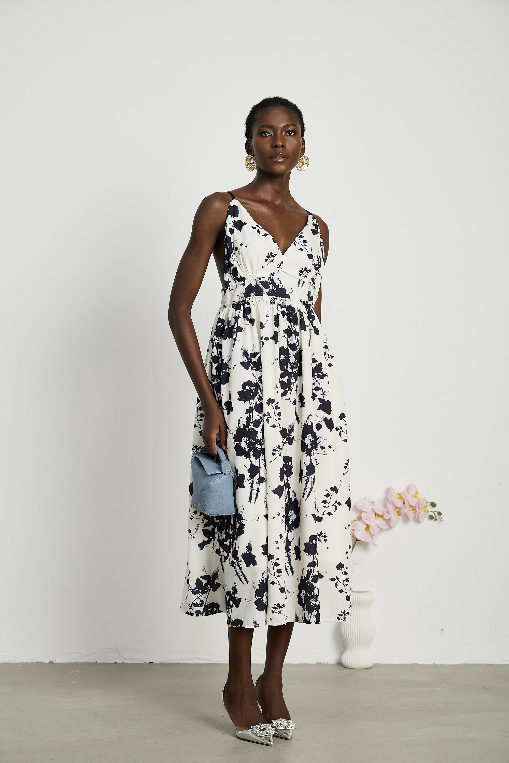 Persephone pleated floral-print midi dress