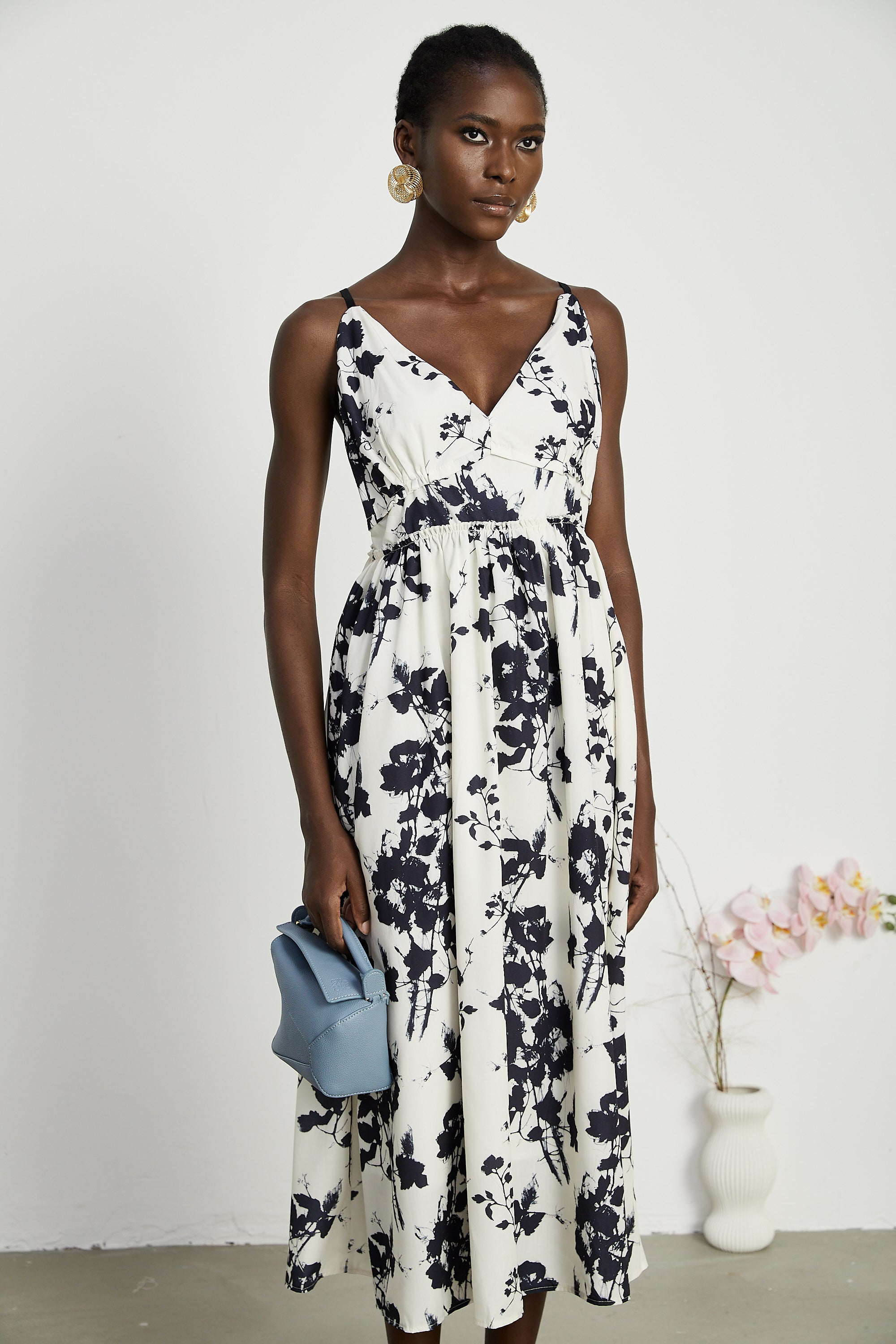 Persephone pleated floral-print midi dress