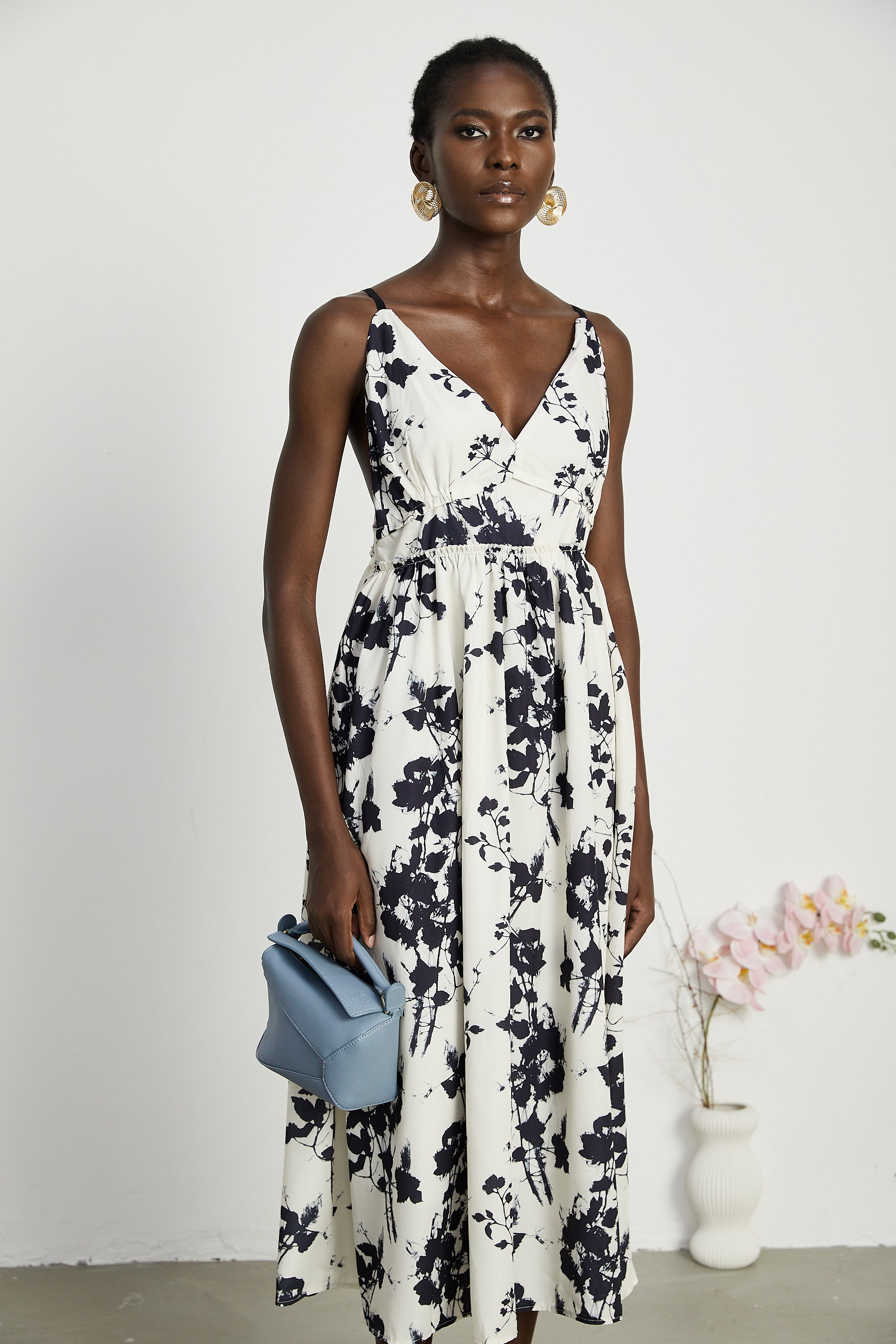 Persephone pleated floral-print midi dress