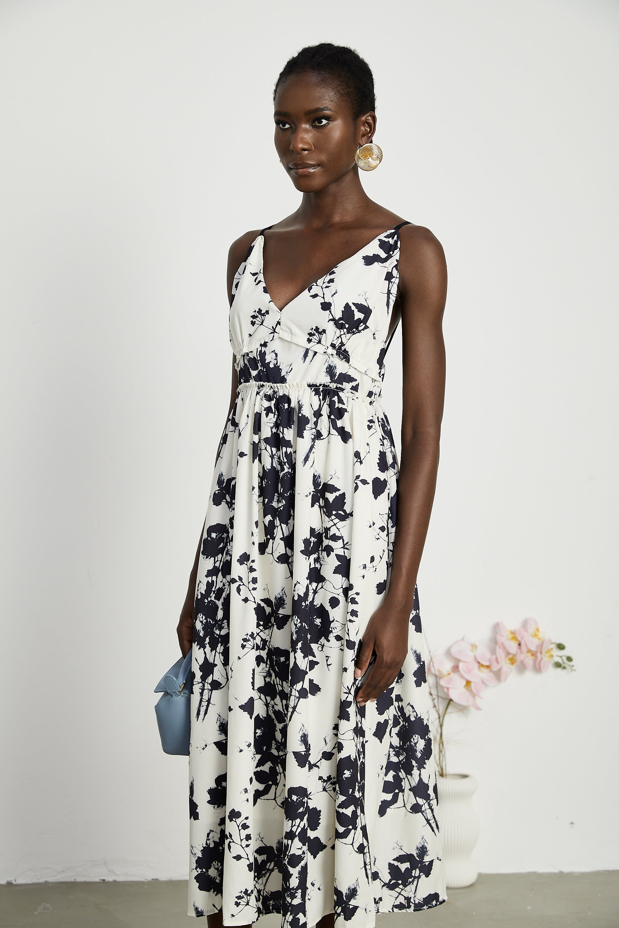 Persephone pleated floral-print midi dress