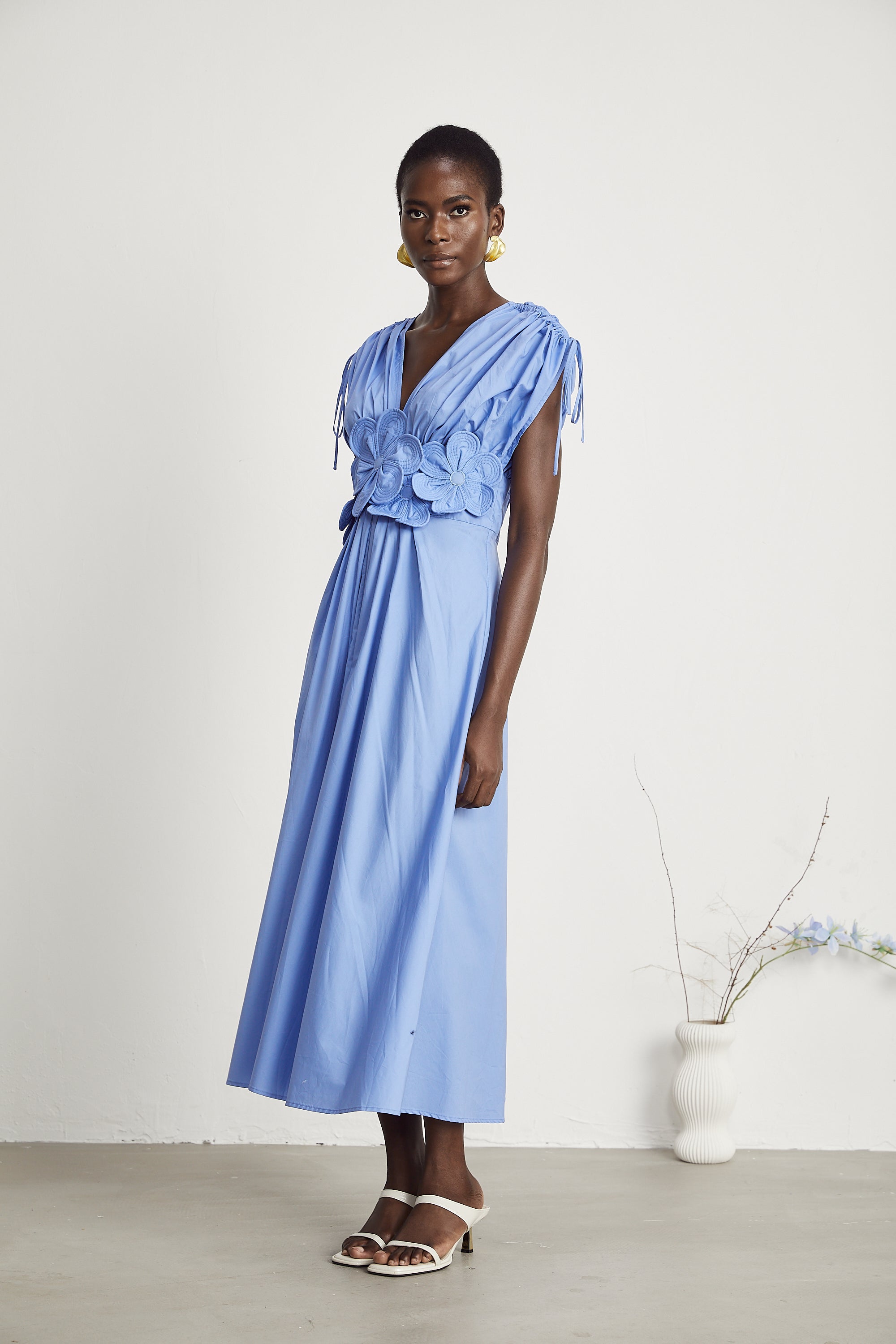 Emma petal-detail drawstring maxi dress in Blue