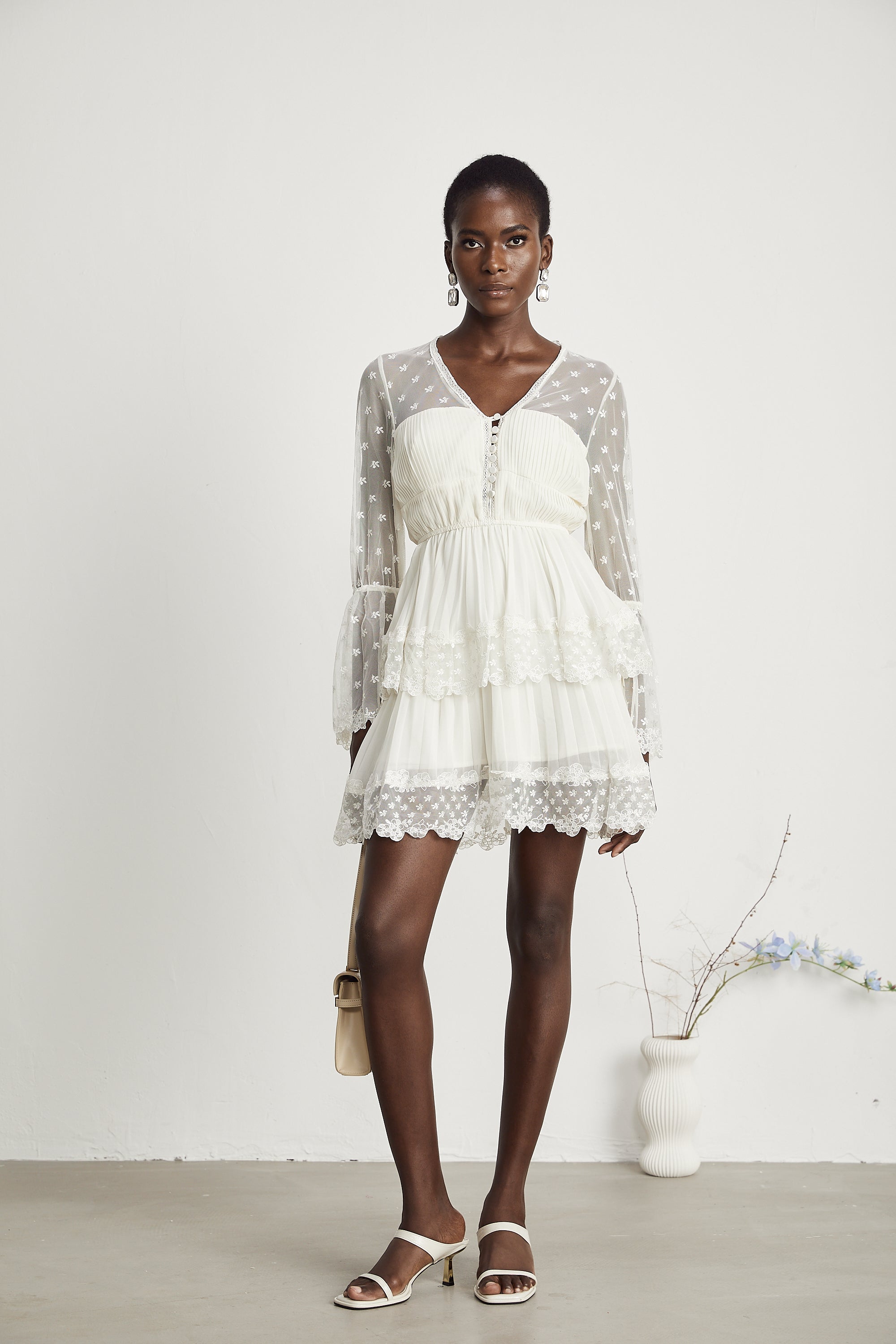 Roseline lace-trim tiered mini dress