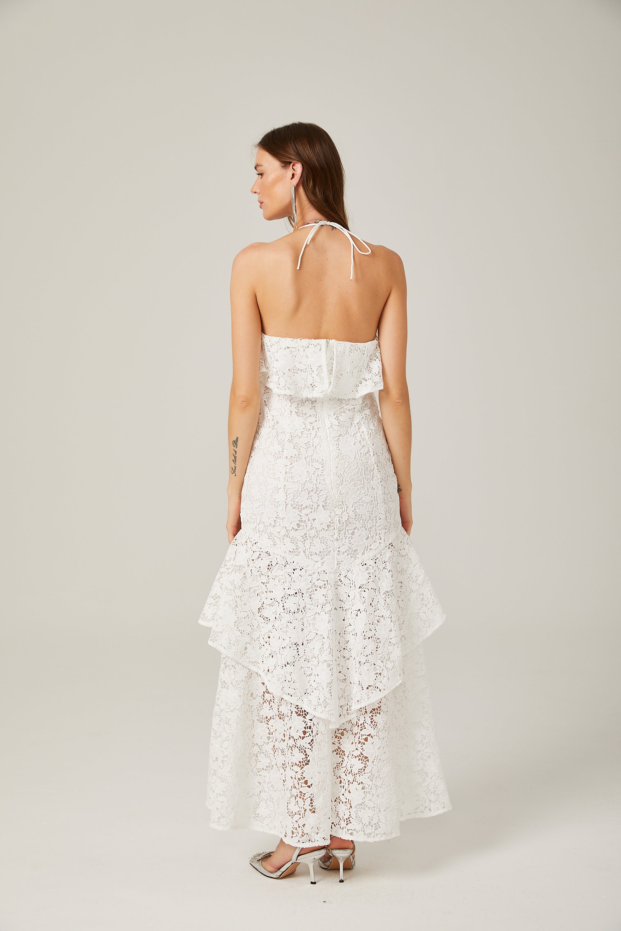 Sancia white ruffled guipure-lace halterneck gown