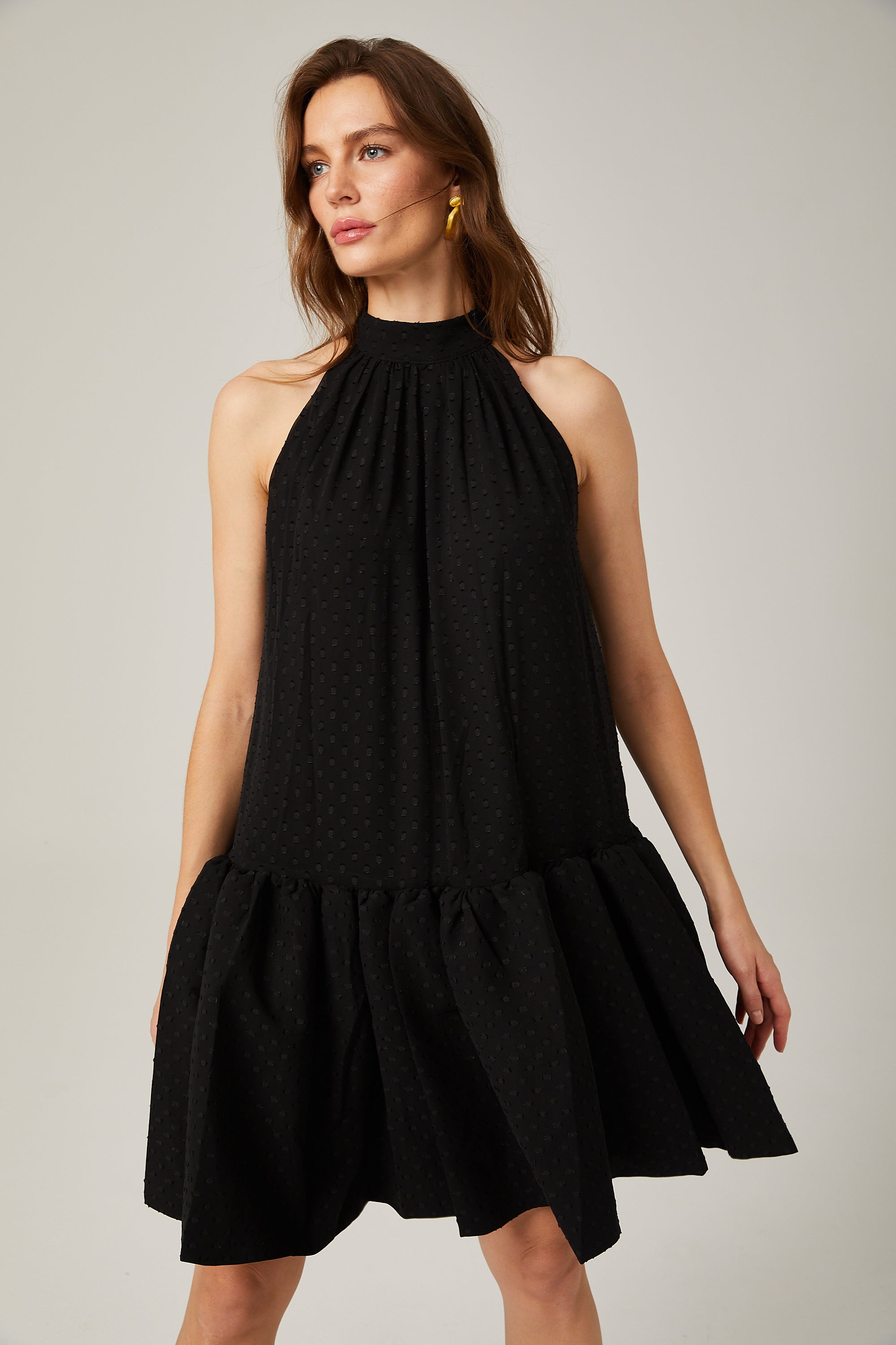 Aniya black polka-dot halterneck mini dress