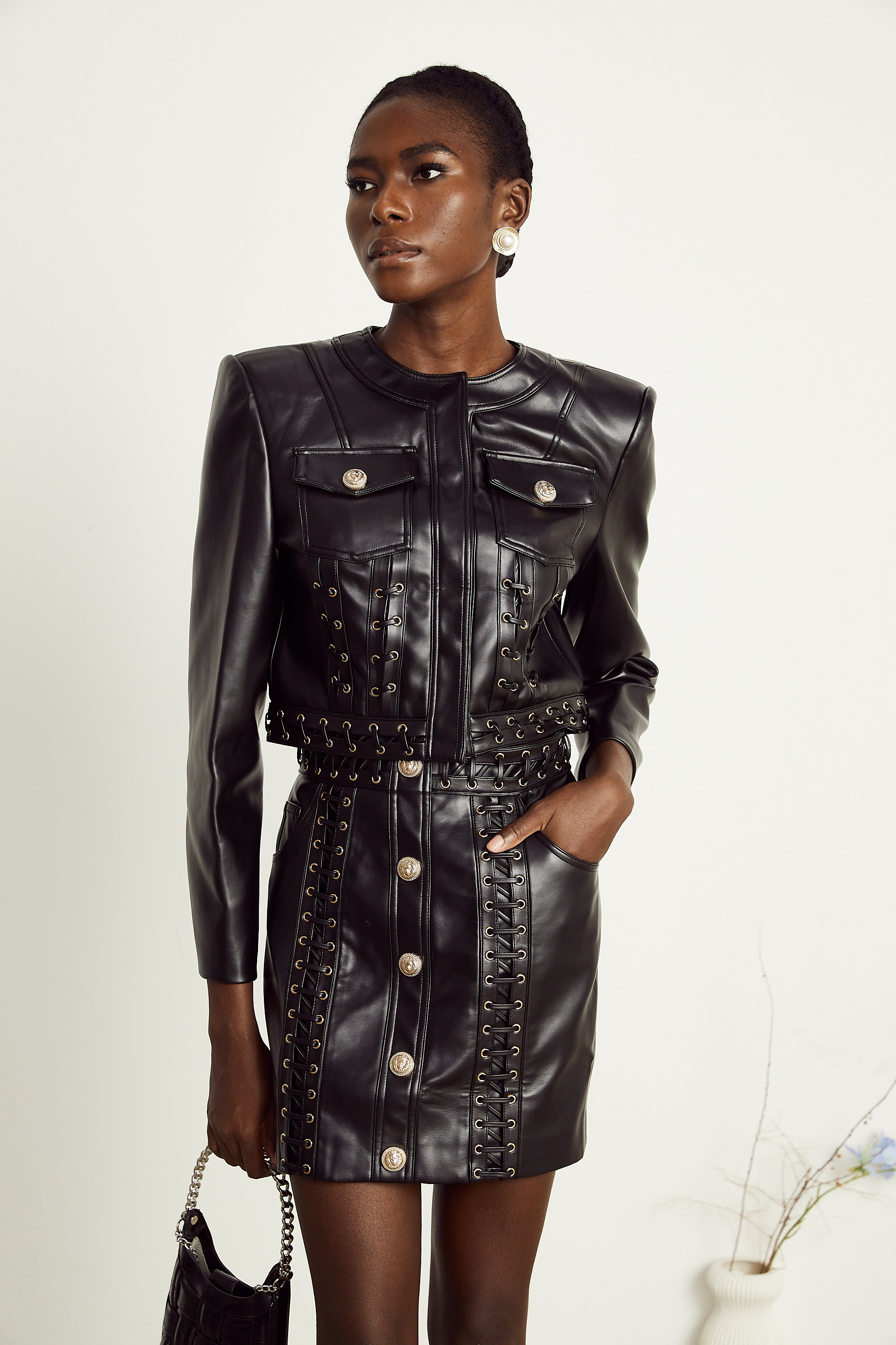 Daphné eyelet-embellished leather jacket & skirt matching set