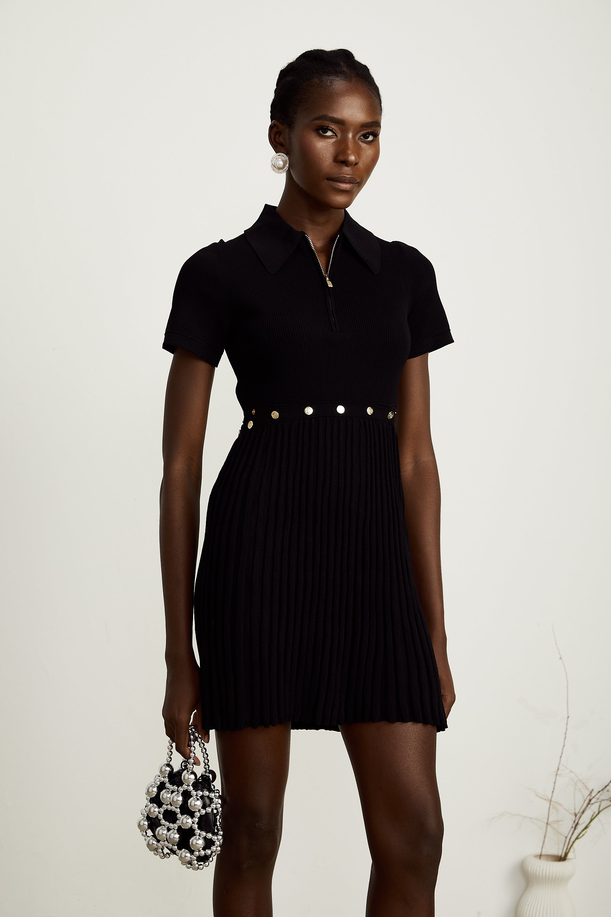 Coline black knitted pleated mini dress