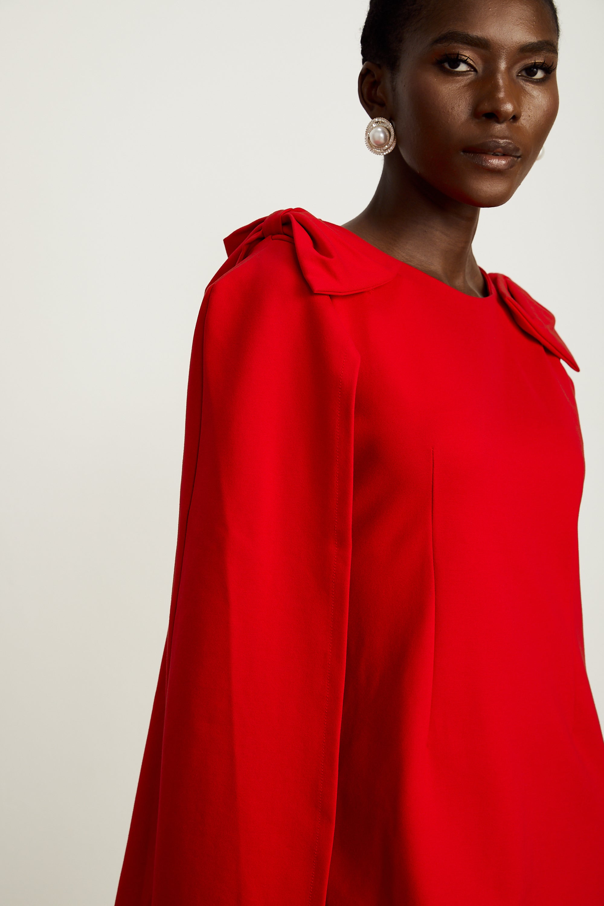 Judith red bow-detail cape mini dress