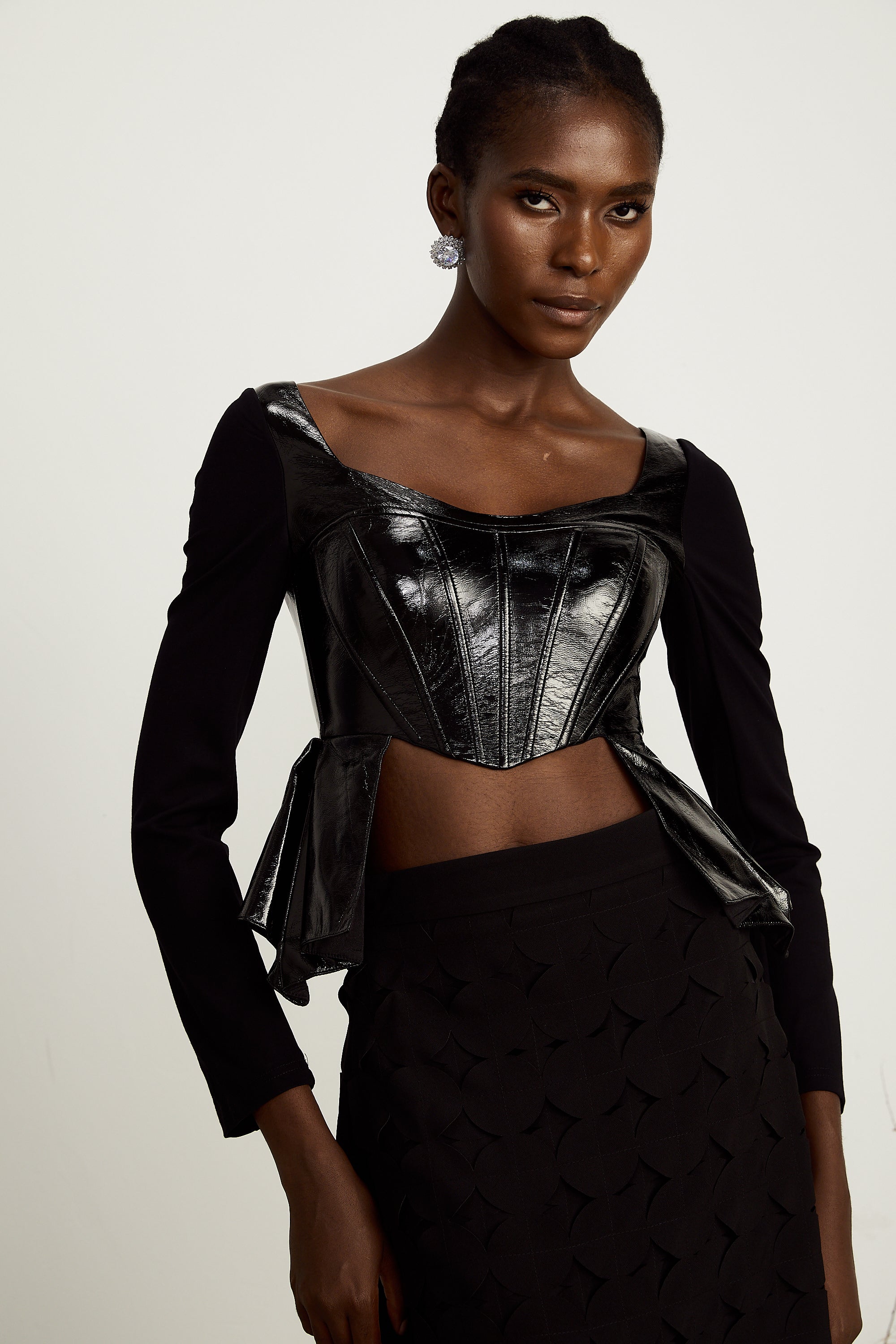 Jeannette faux-leather peplum panelled top