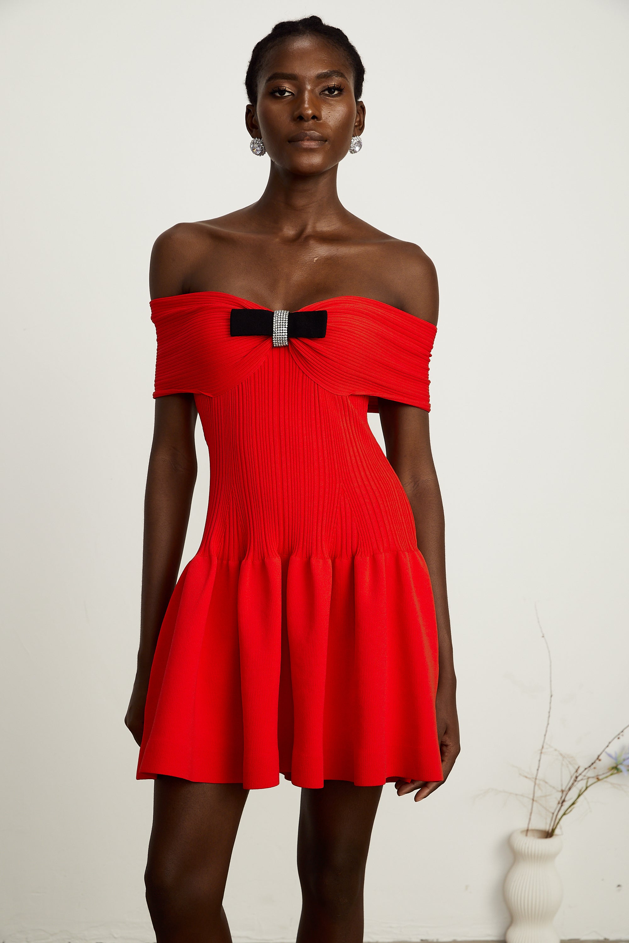 Coralie bow-detail knitted mini dress