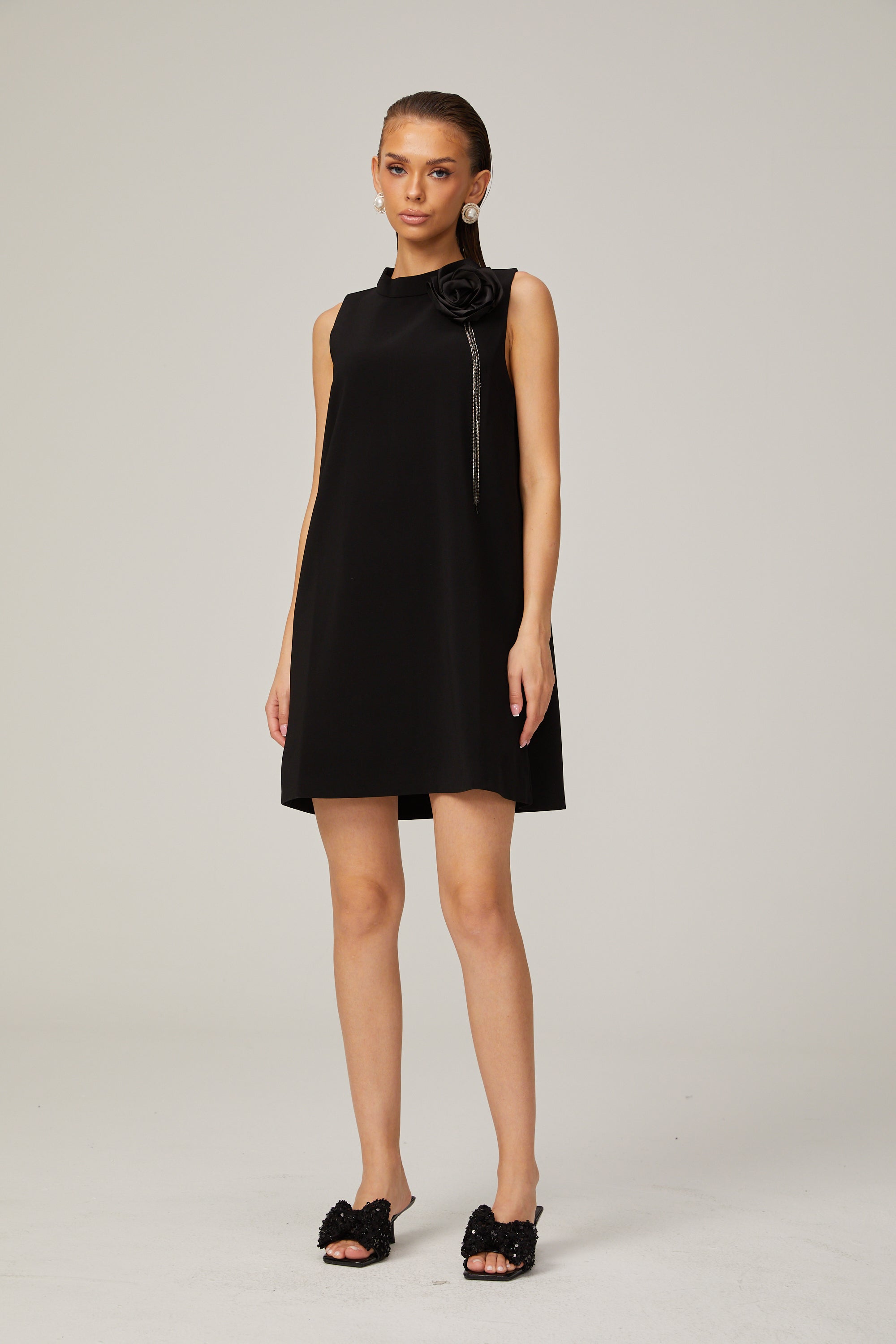 Gisella black flower-appliqué sleeveless mini dress