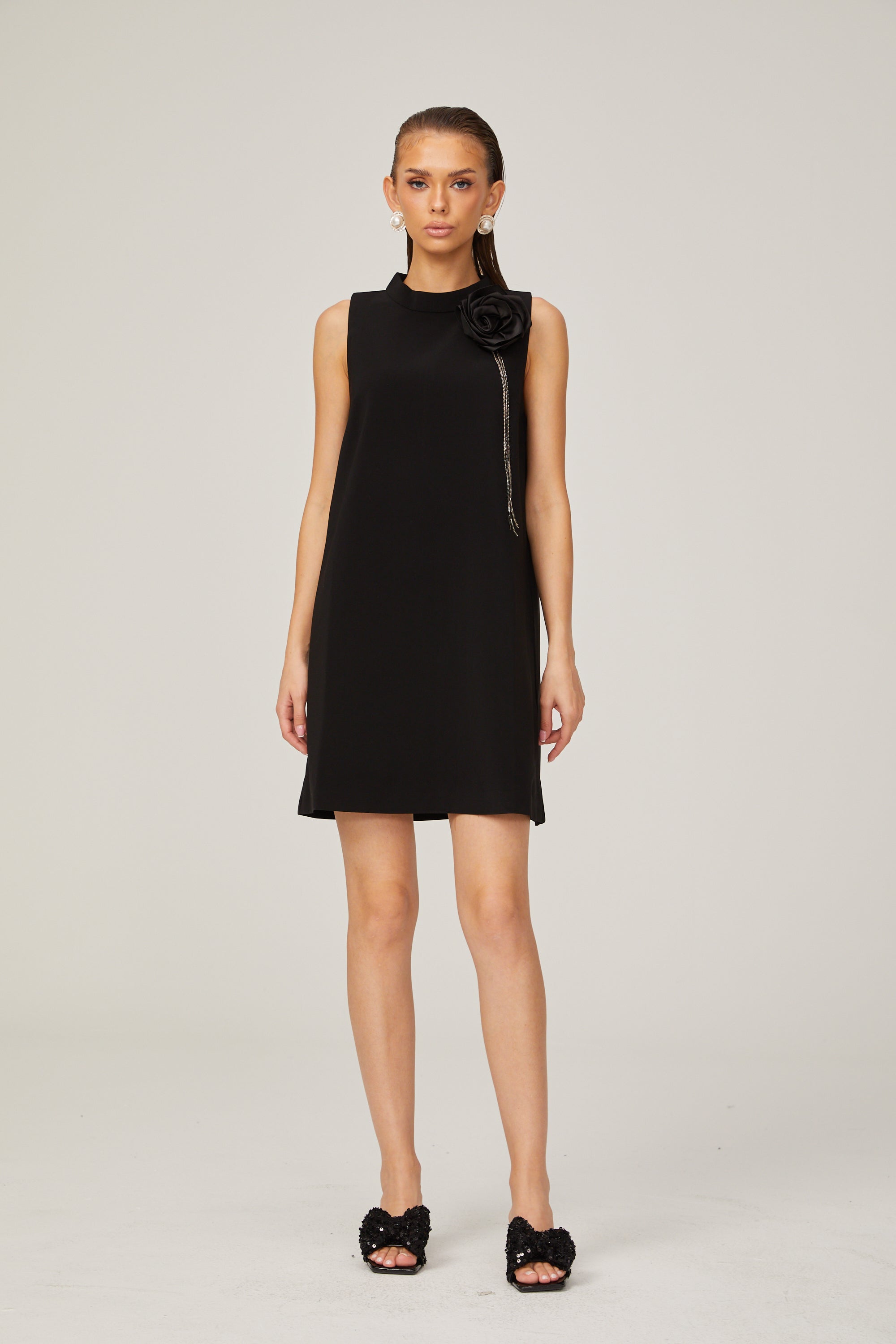 Gisella black flower-appliqué sleeveless mini dress