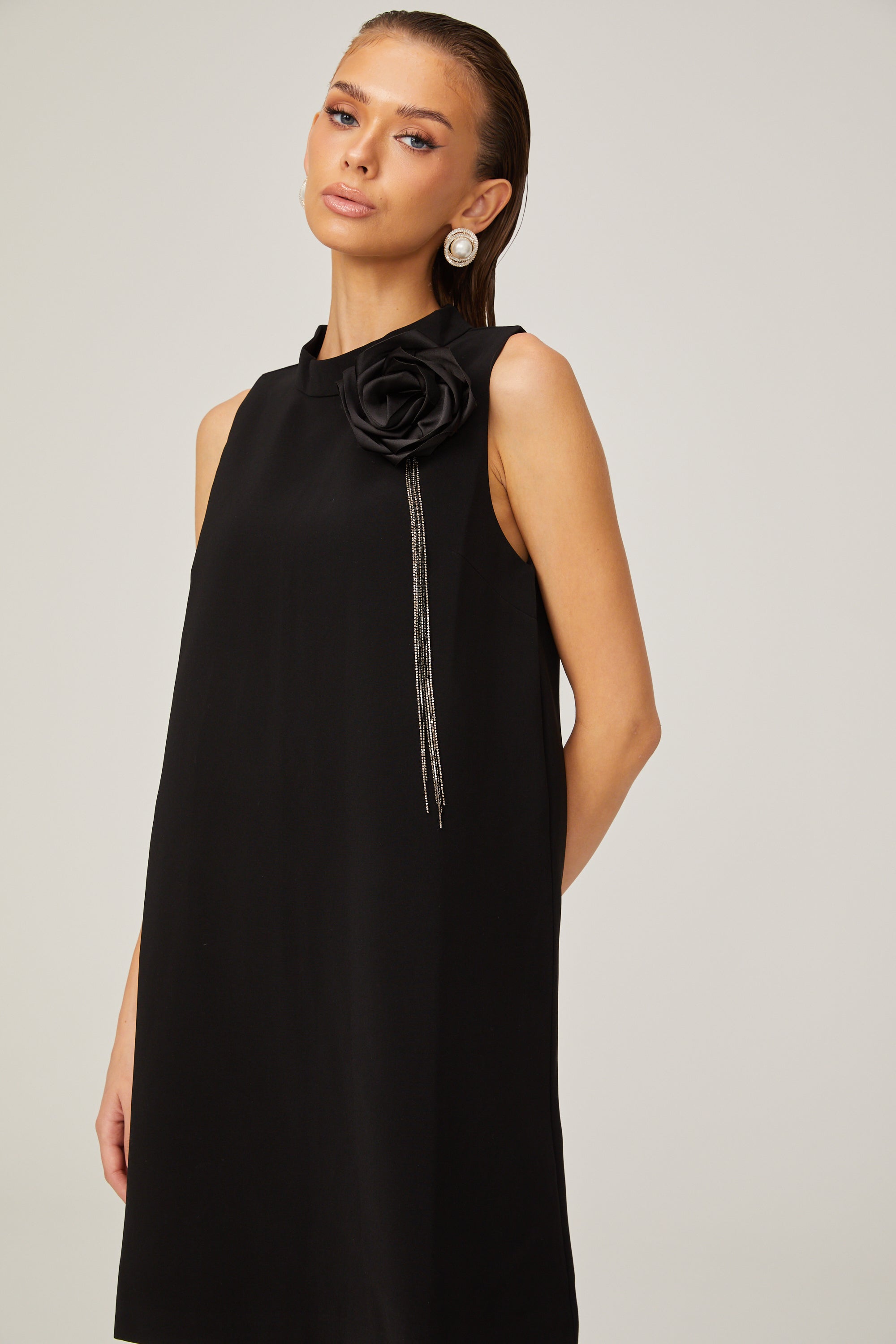 Gisella black flower-appliqué sleeveless mini dress