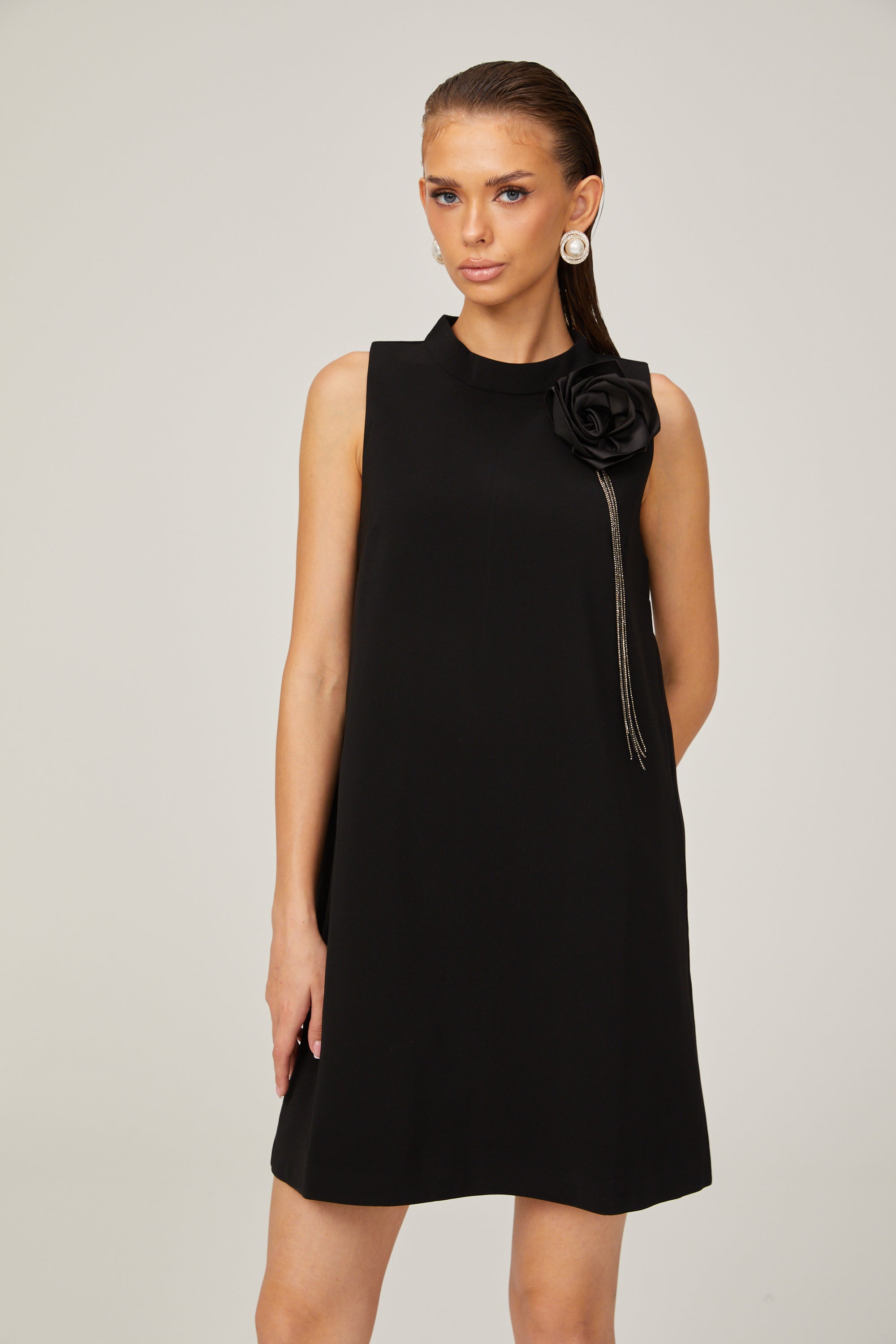 Gisella black flower-appliqué sleeveless mini dress