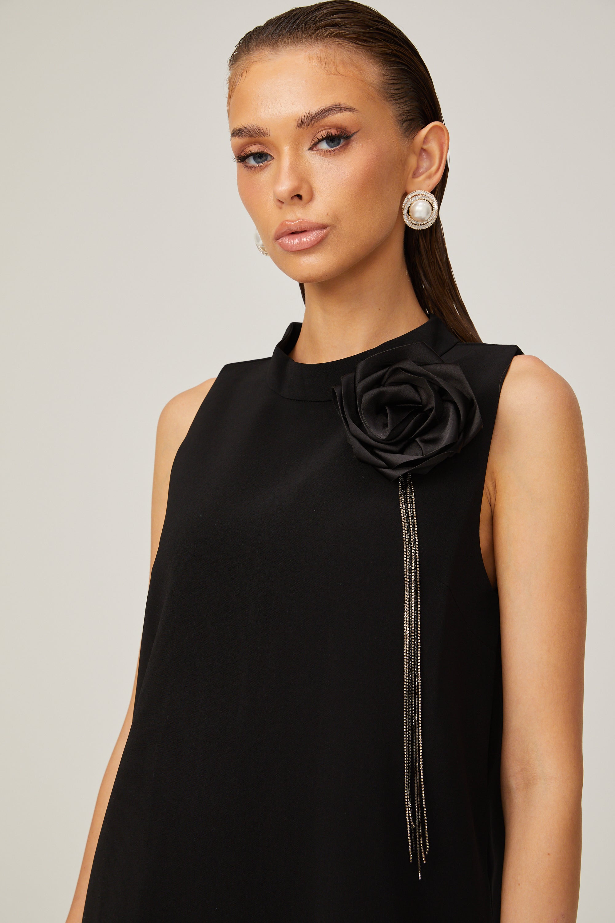 Gisella black flower-appliqué sleeveless mini dress