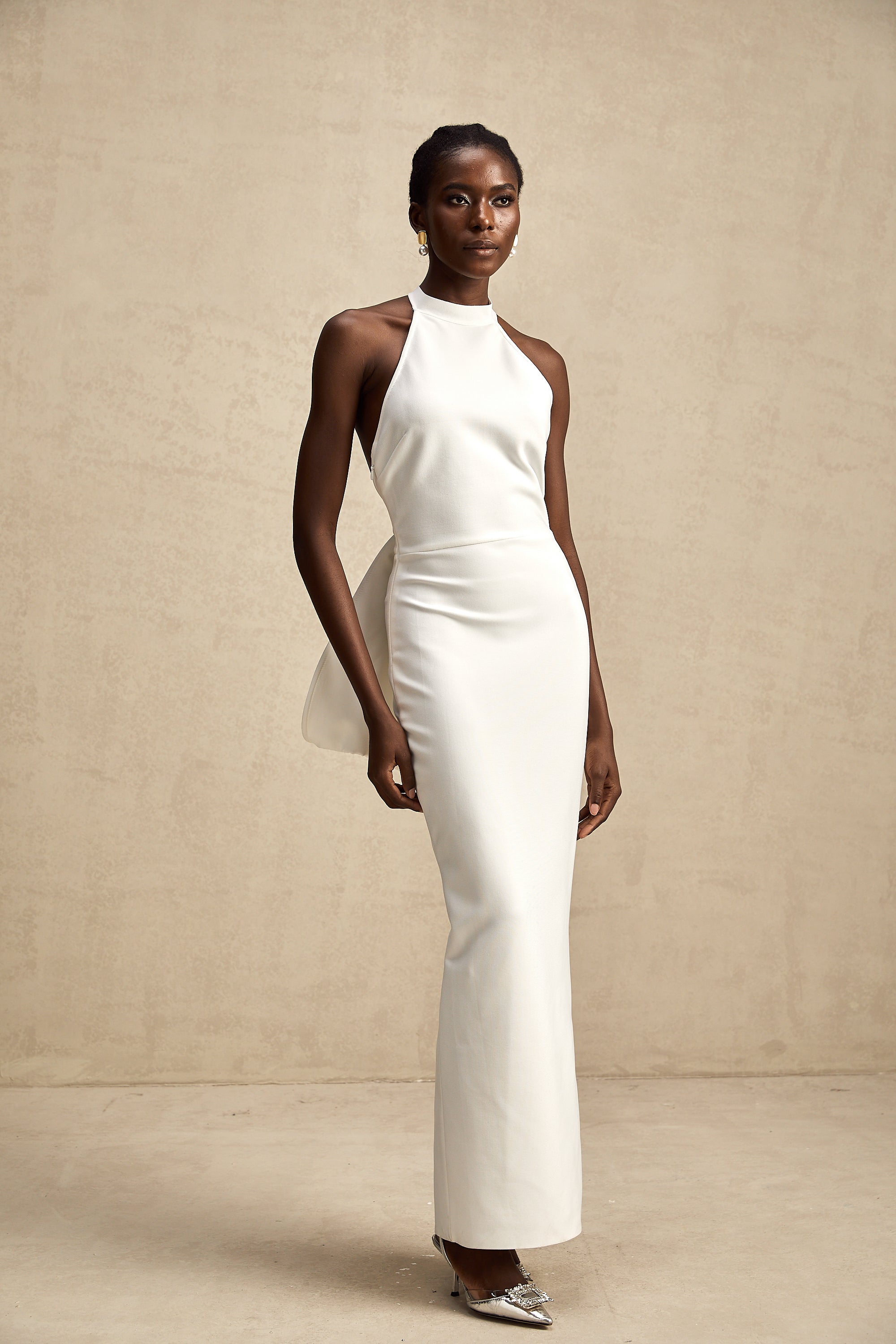 Capucine white oversize-bow bandage dress