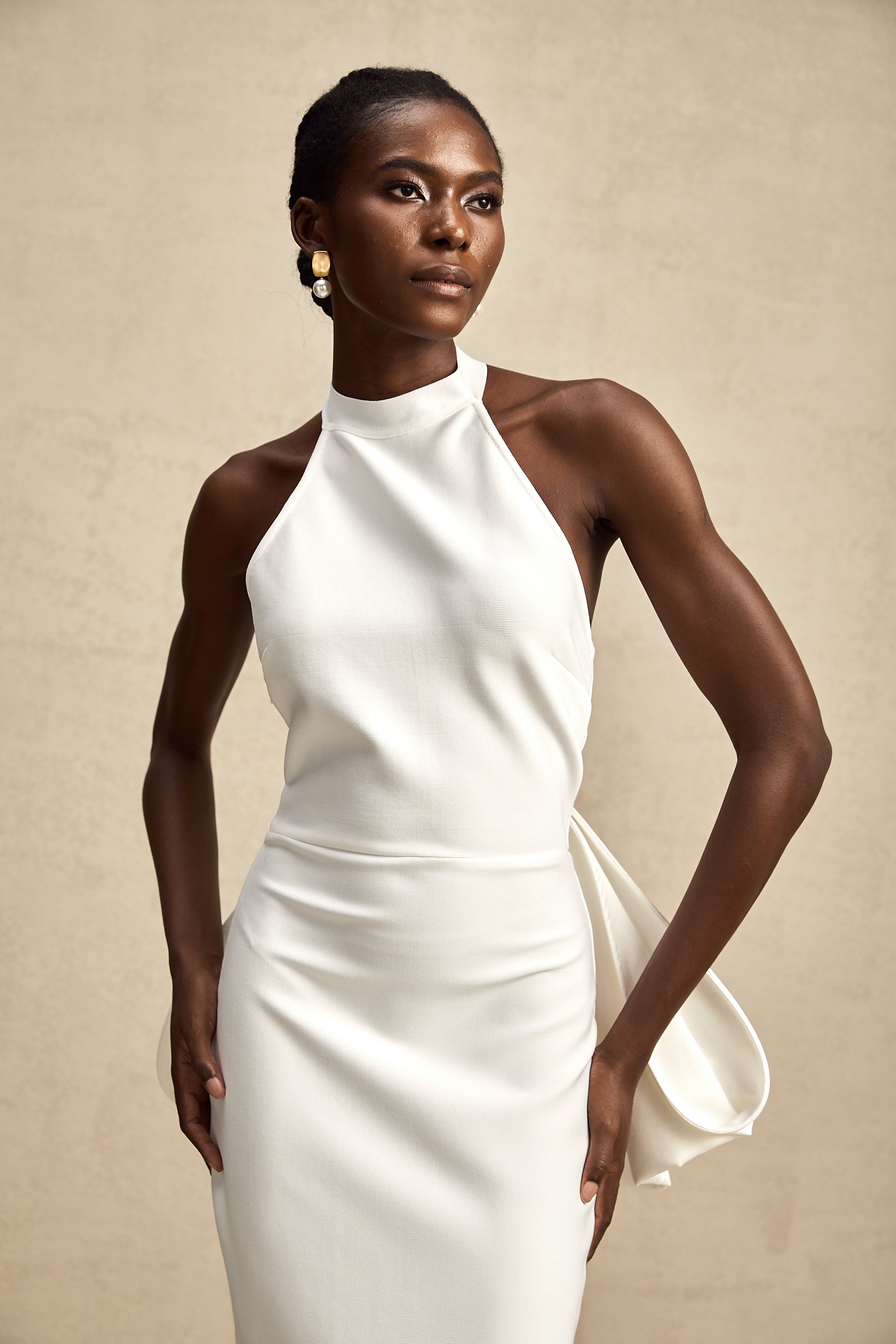 Capucine white oversize-bow bandage dress