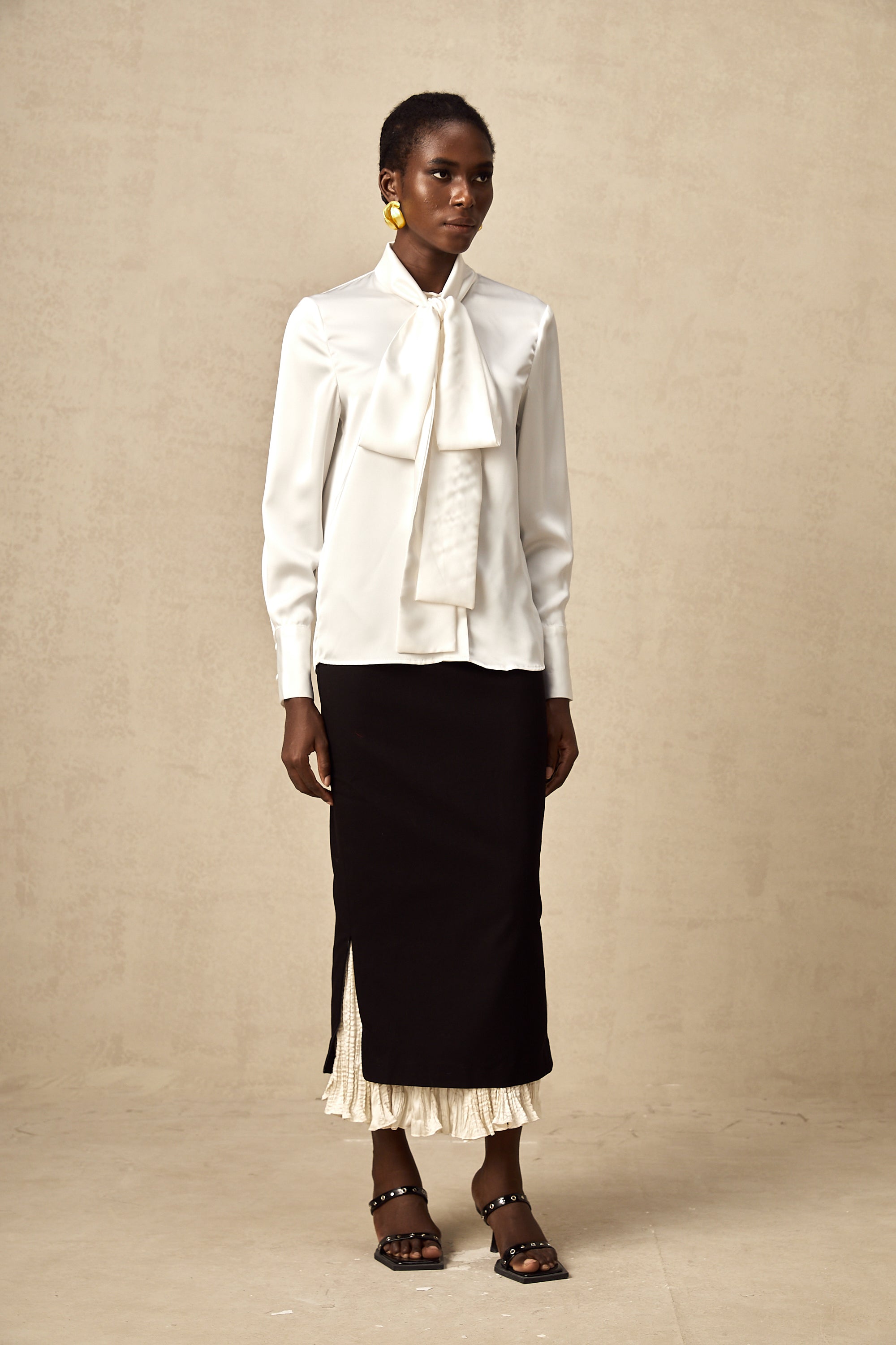 Héloïse color-blocked panelled midi skirt