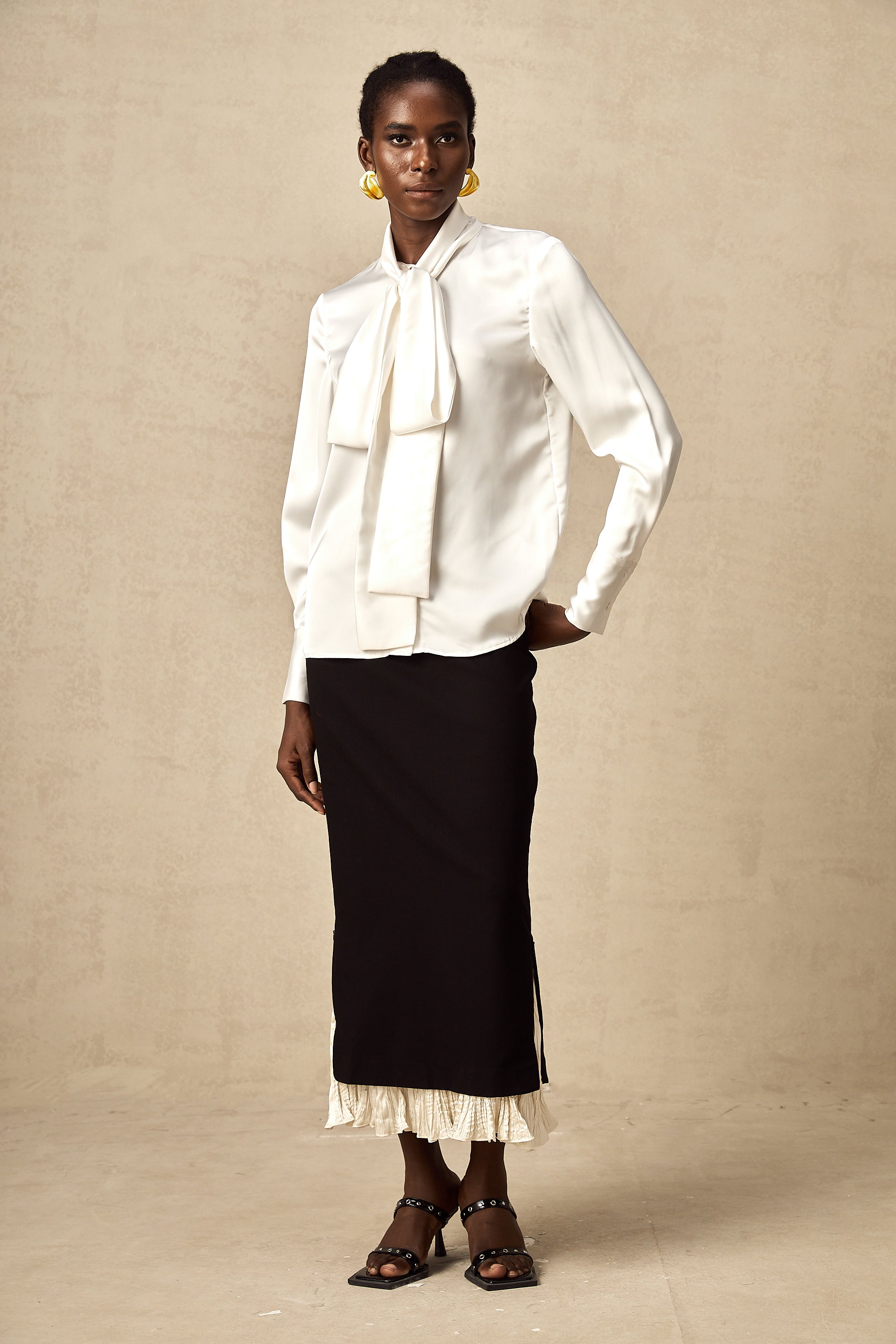 Héloïse color-blocked panelled midi skirt