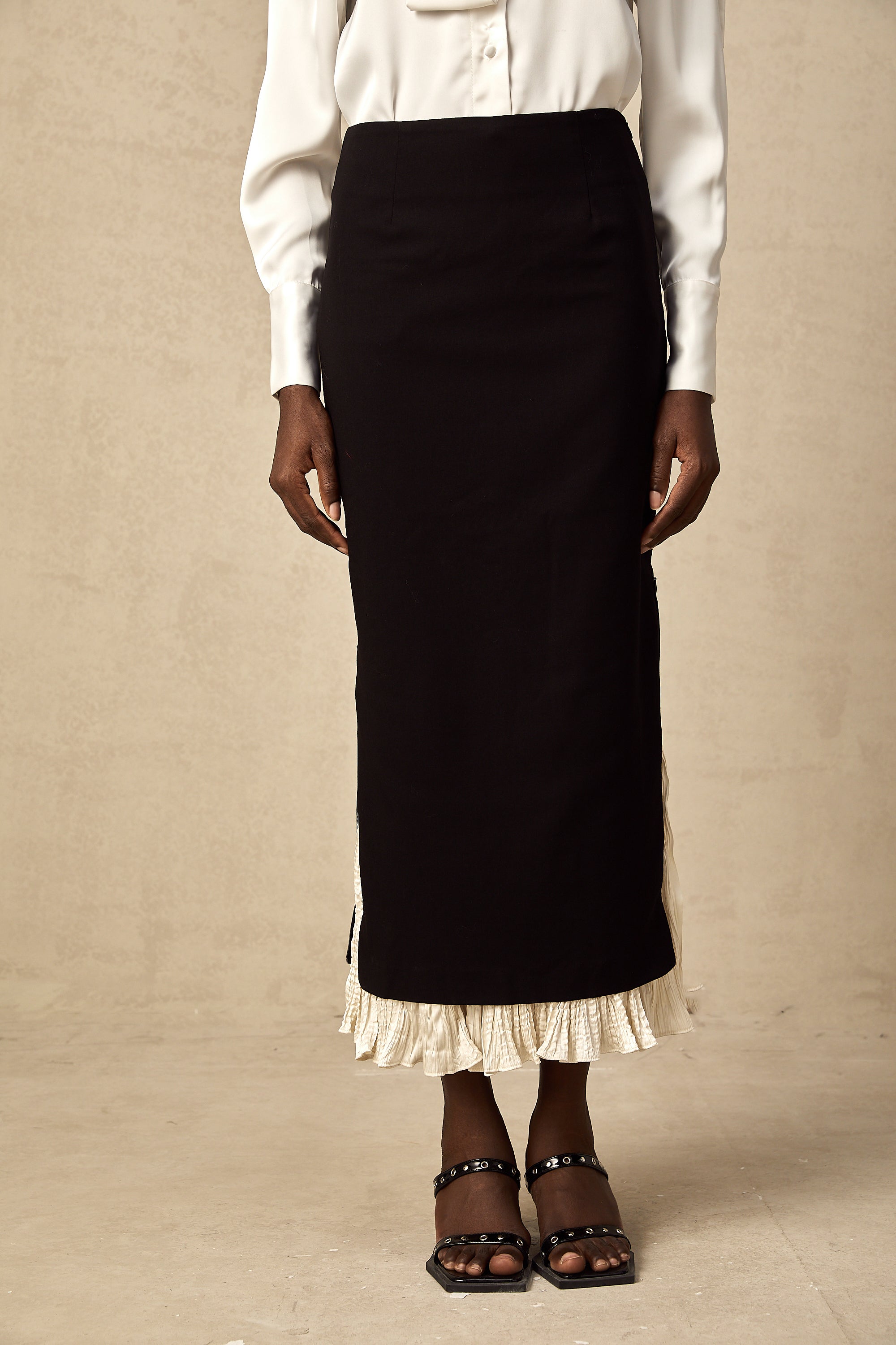 Héloïse color-blocked panelled midi skirt