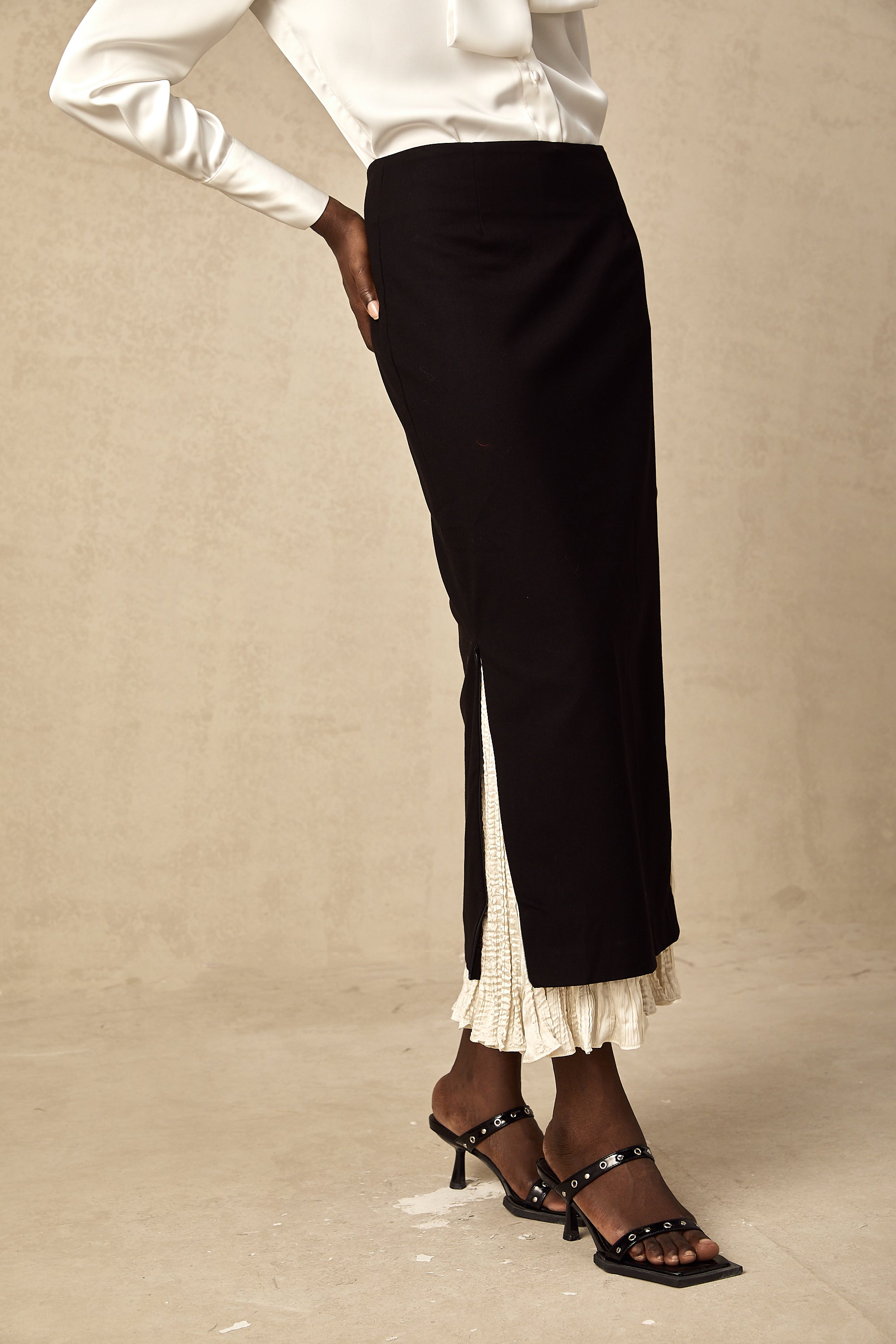 Héloïse color-blocked panelled midi skirt