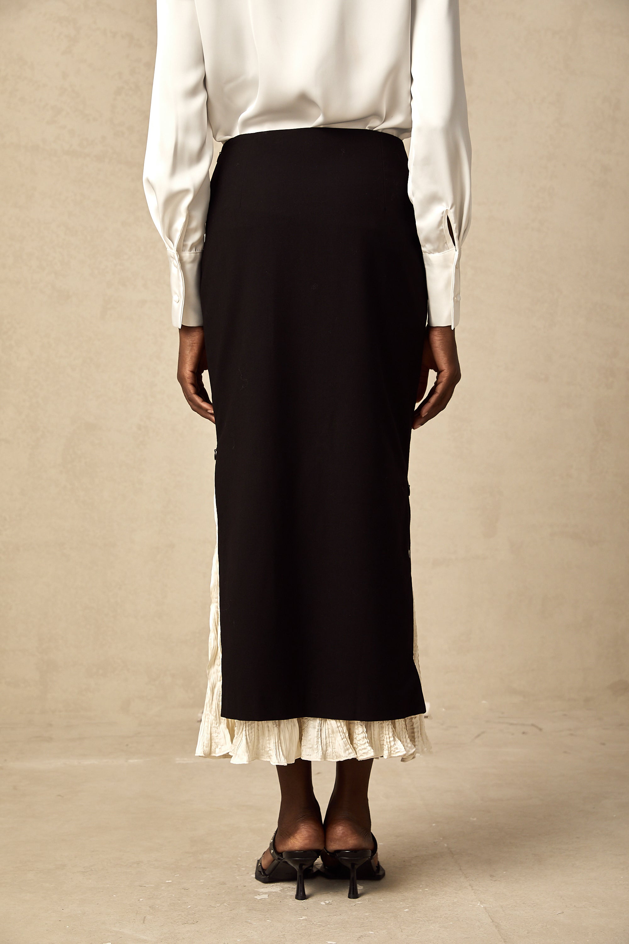 Héloïse color-blocked panelled midi skirt