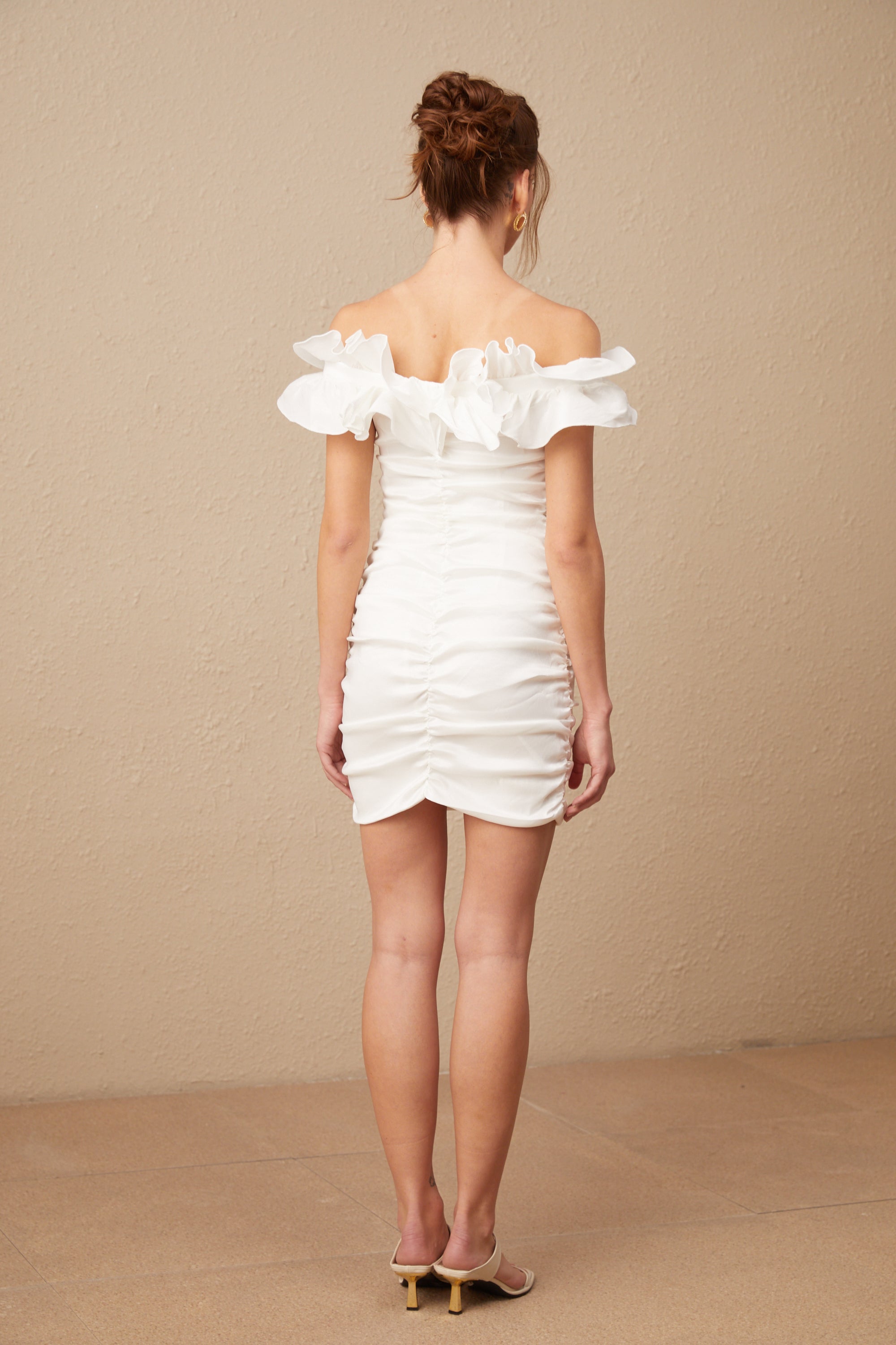 Aïssatou white off-shoulder ruffled mini dress