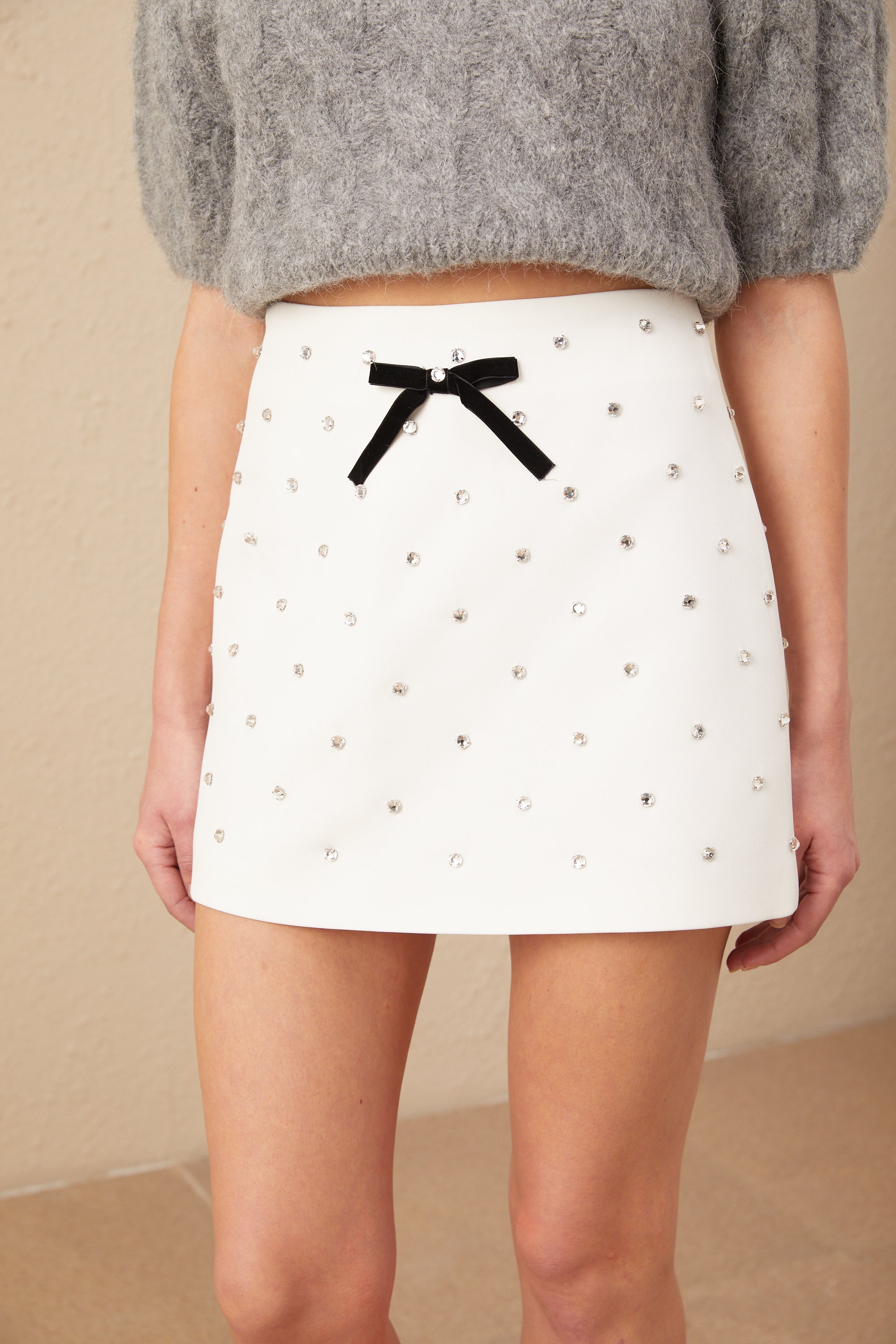 Gabrielle white bowknot crystal-embellished mini skirt