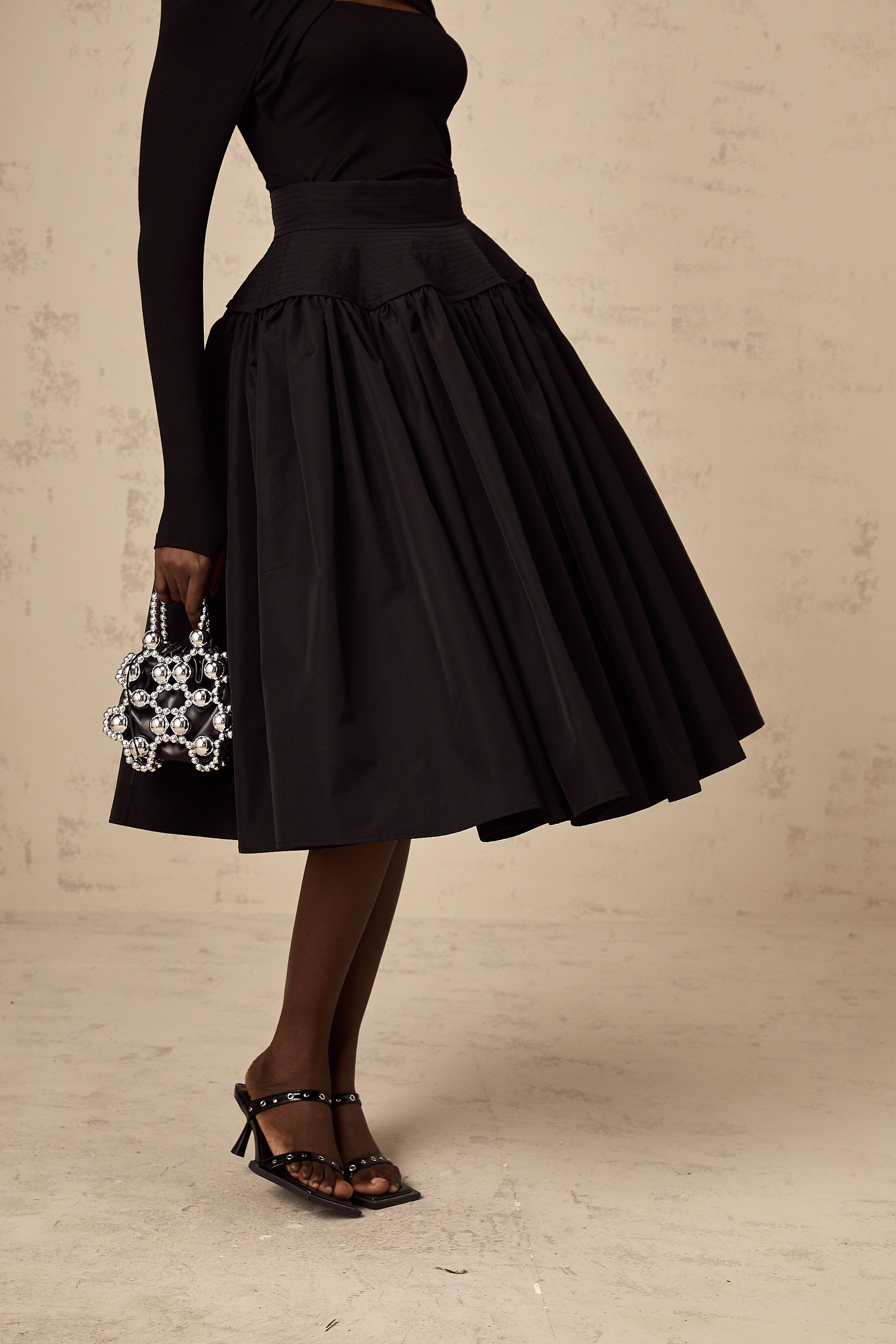 Pauline black pleated flared midi skirt