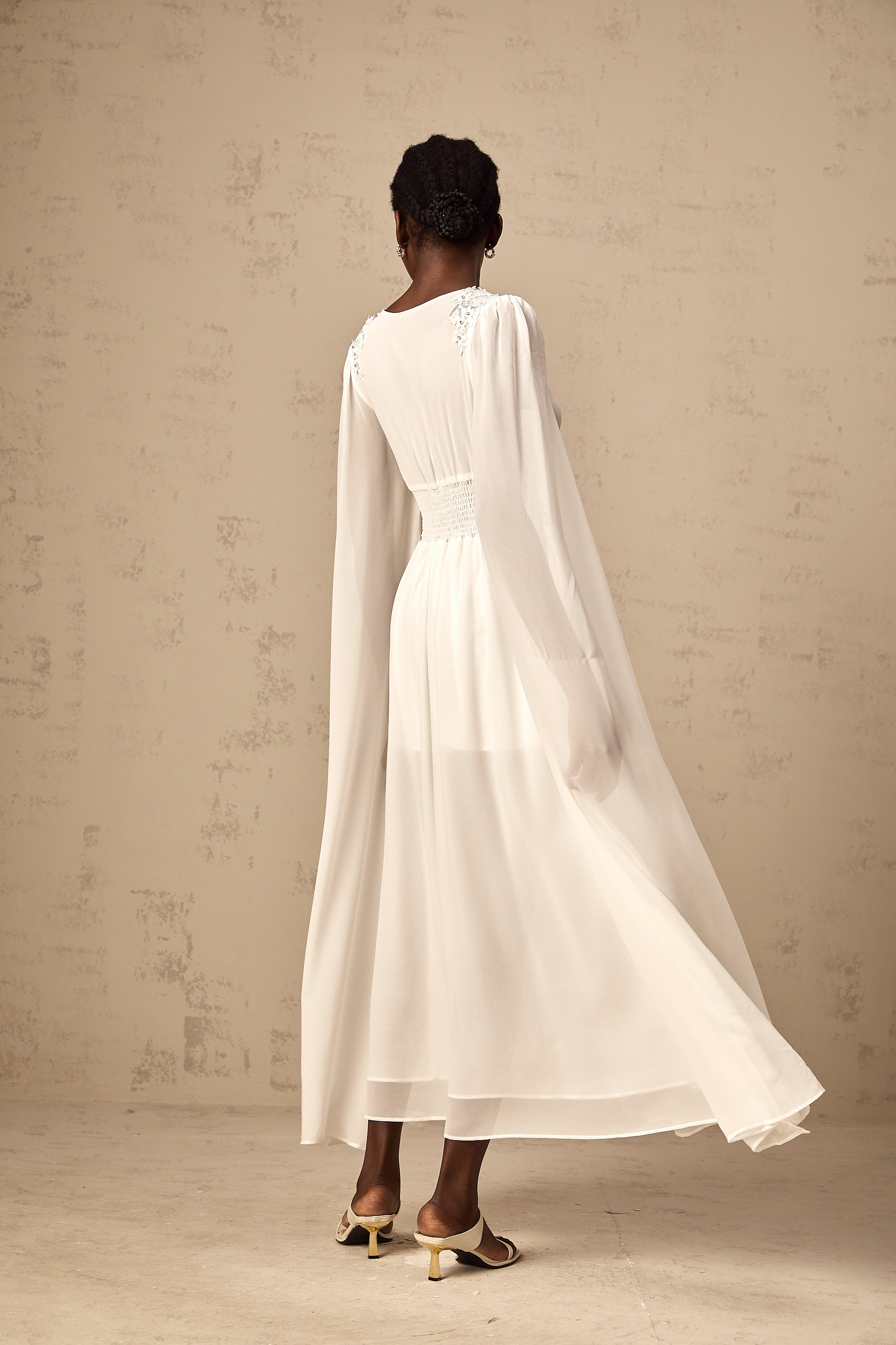 Sylvie white slit-sleeve beaded chiffon gown