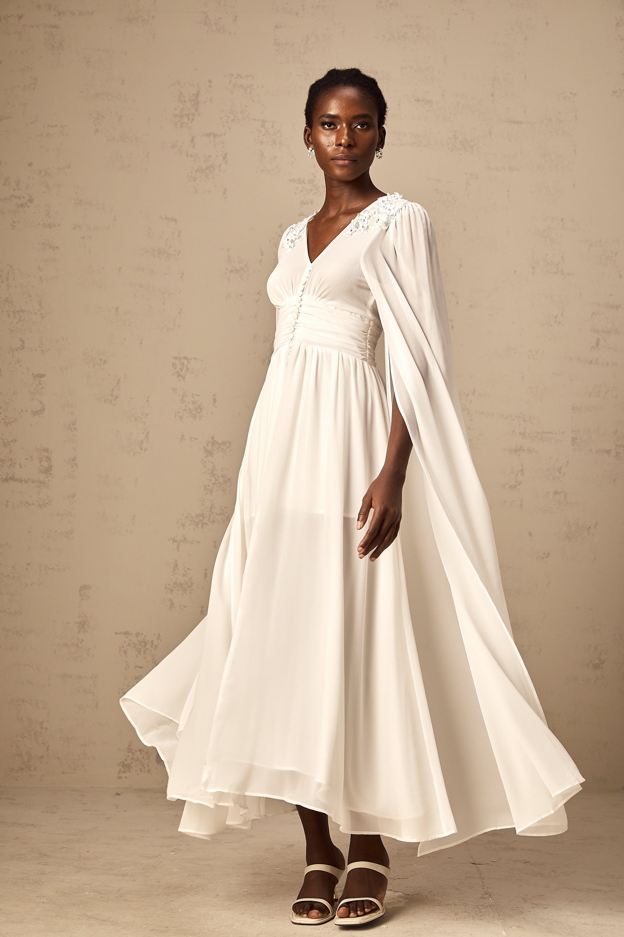 Sylvie white slit-sleeve beaded chiffon gown