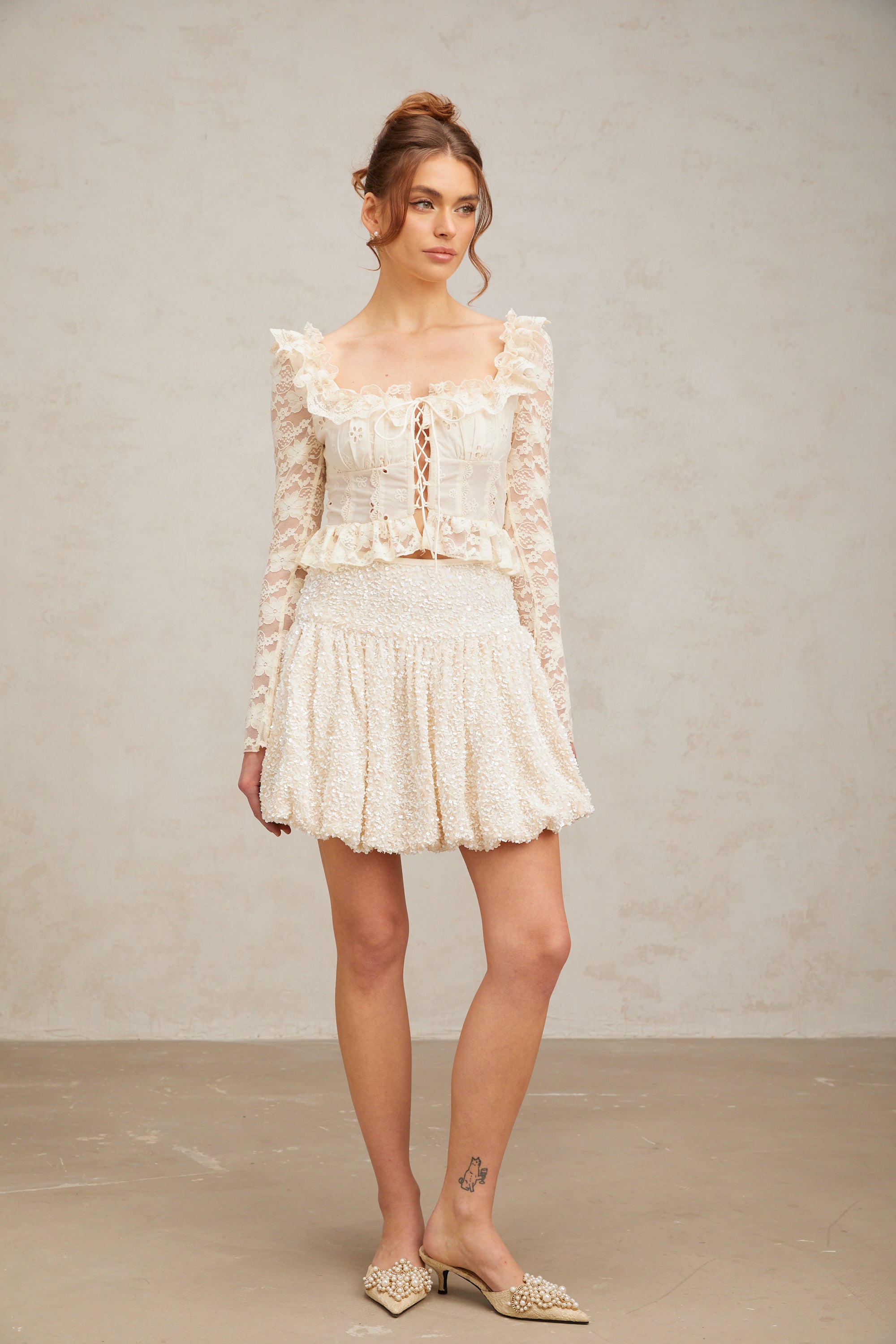 Eugénie off-white floral-lace ruffled blouse