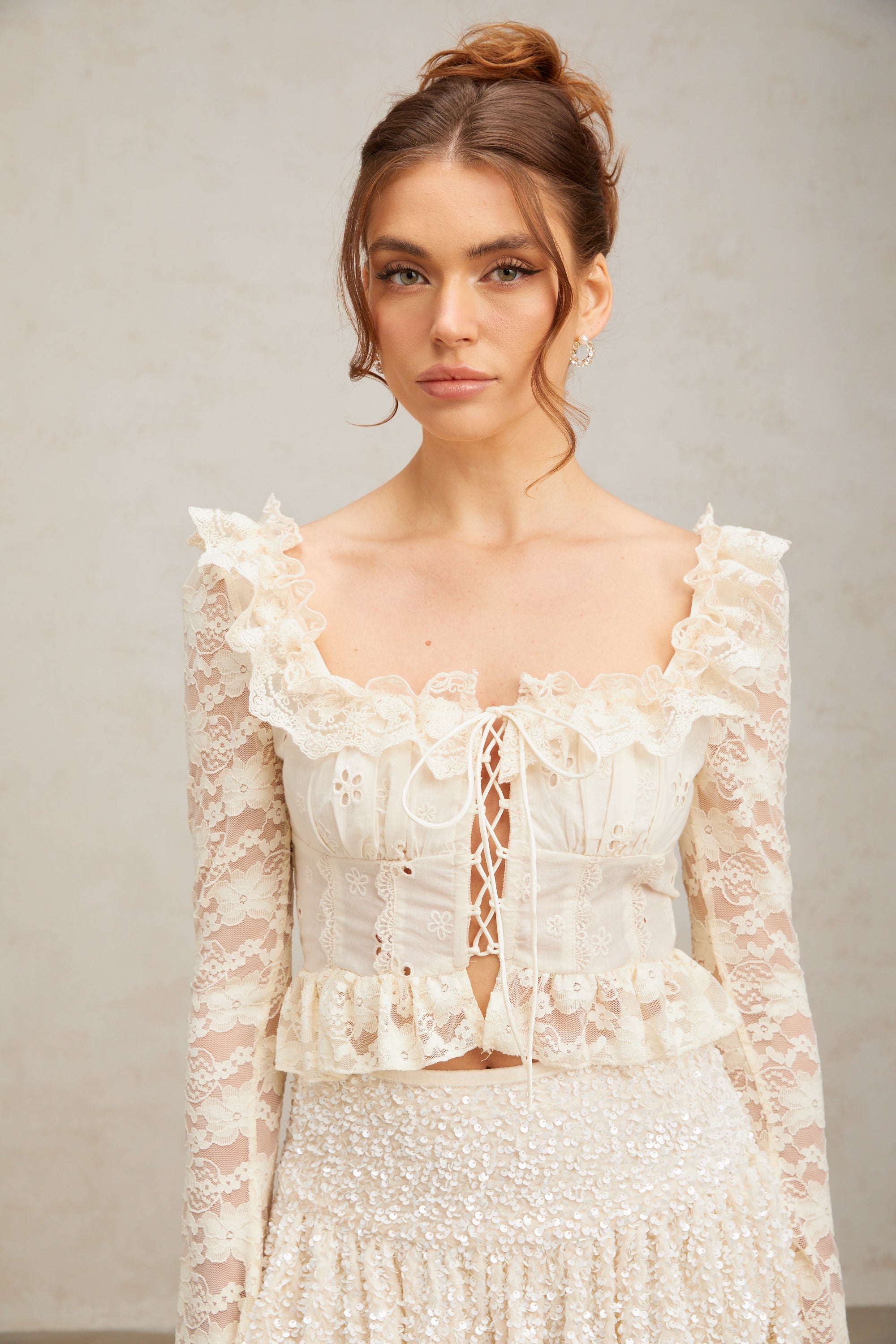 Eugénie off-white floral-lace ruffled blouse