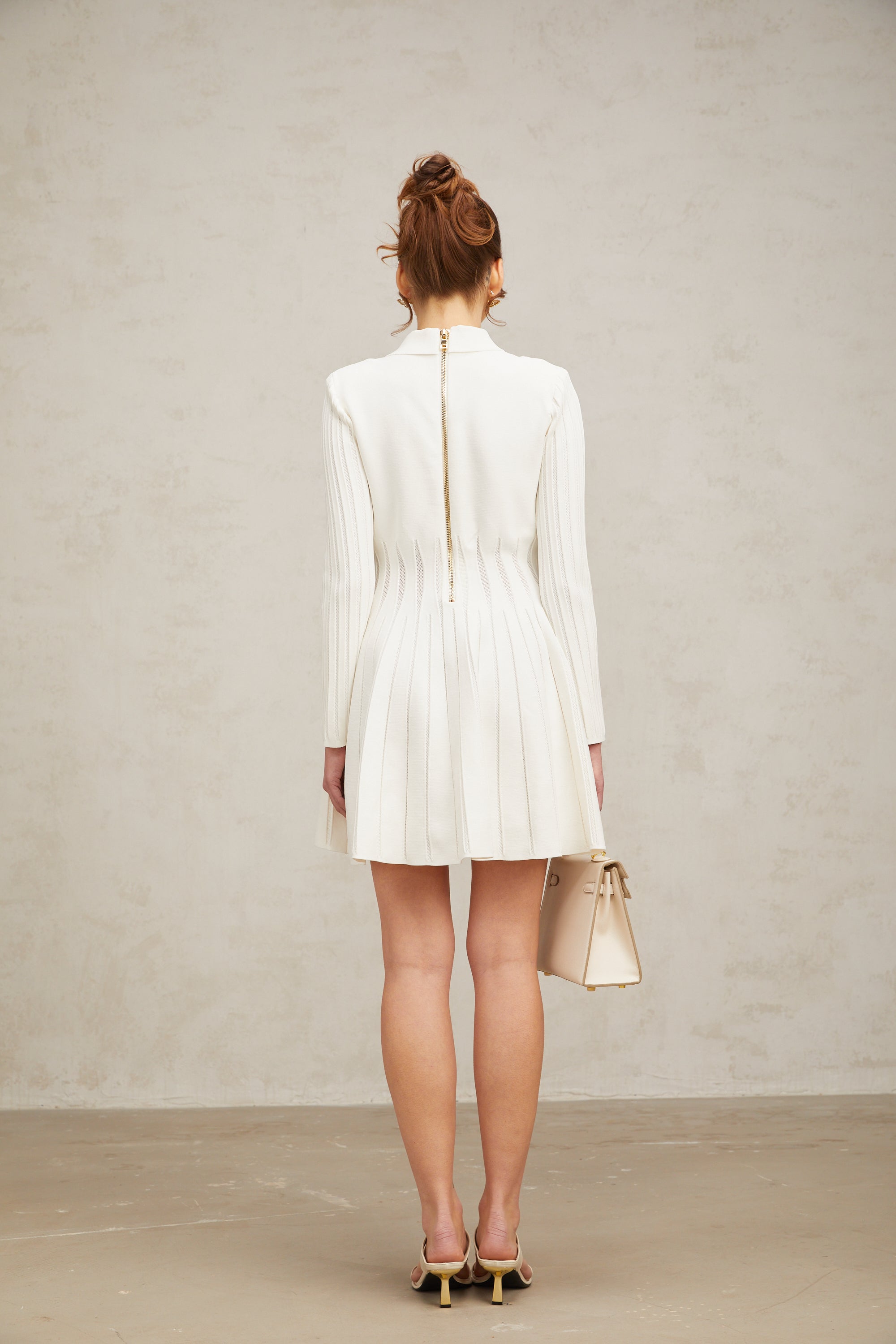 Emeline white pleated knit mini dress